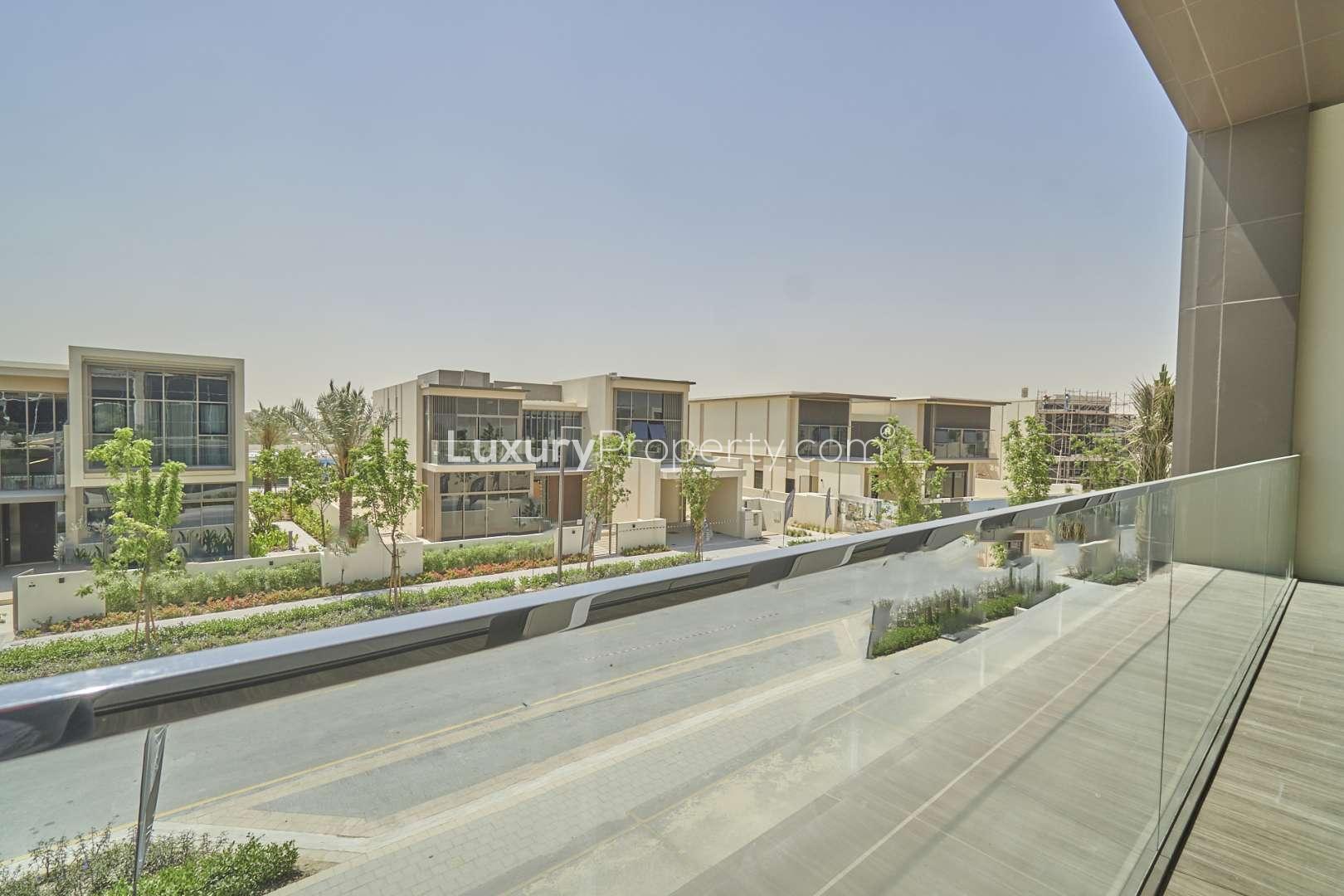 6-Bedroom Villa Exterior with Lawn and Golf Course Views in Dubai Hills Estate