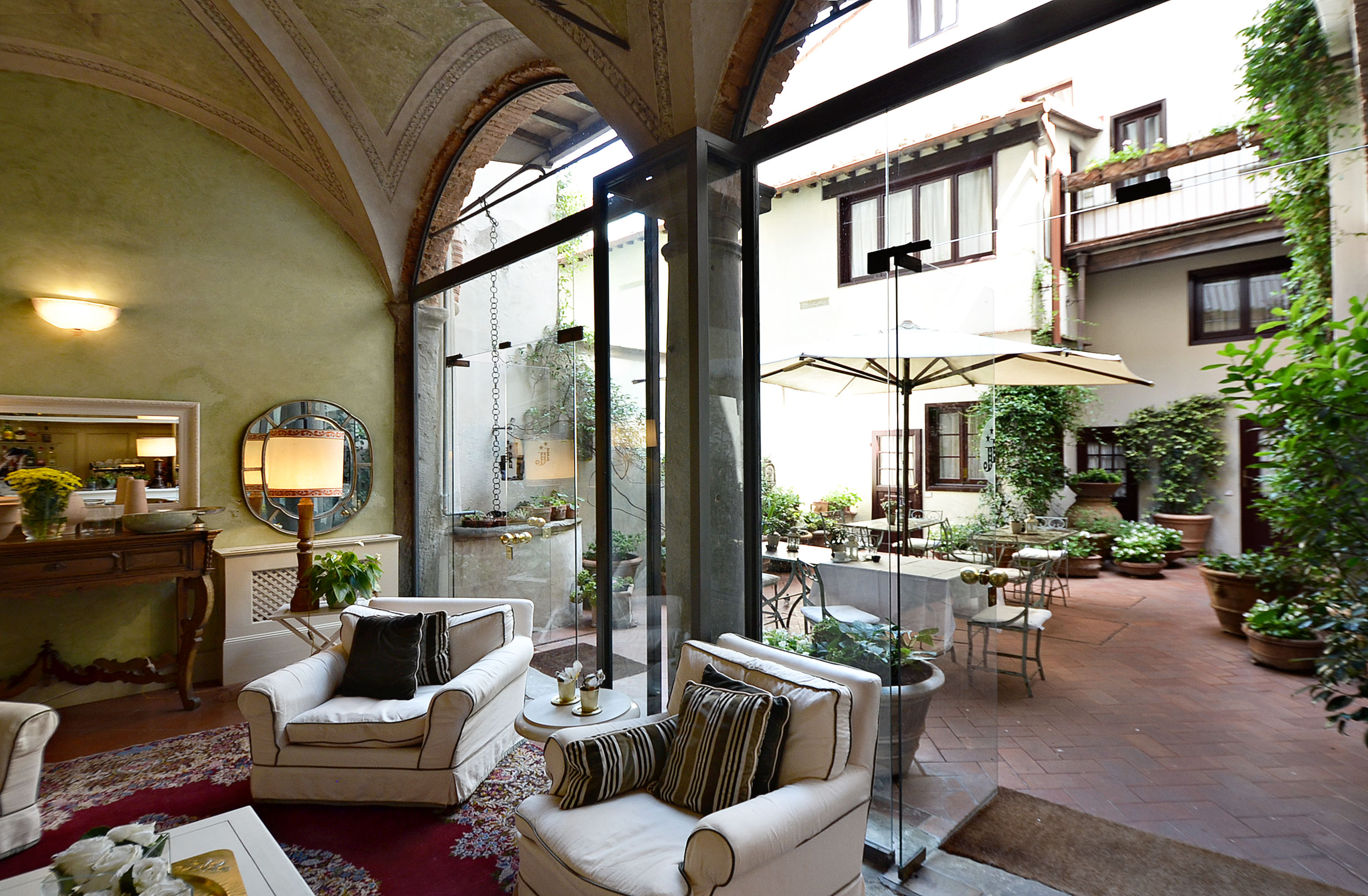 Charming hotel lounge with elegant seating near Piazza Santa Croce, Florence villa for sale