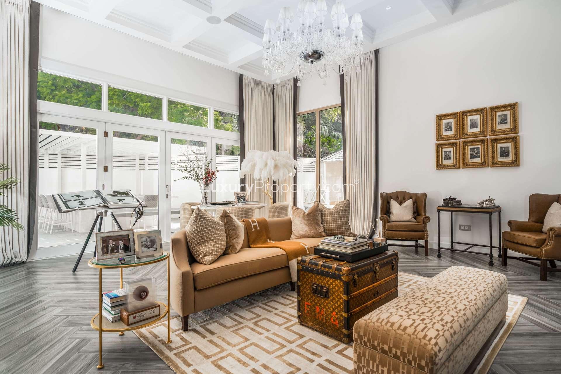 Luxurious villa entrance with marble floors and elegant decor in Al Barari, Jasmine Leaf