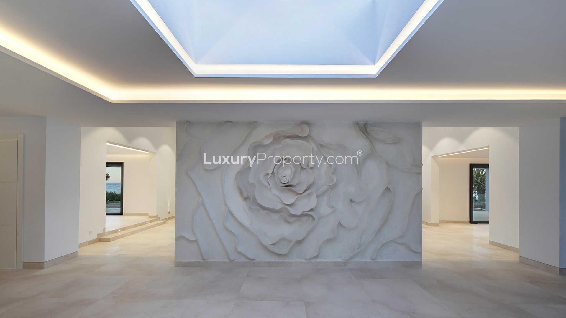 Luxurious beachfront villa in Marbella, Costa del Sol with modern architecture and spacious design