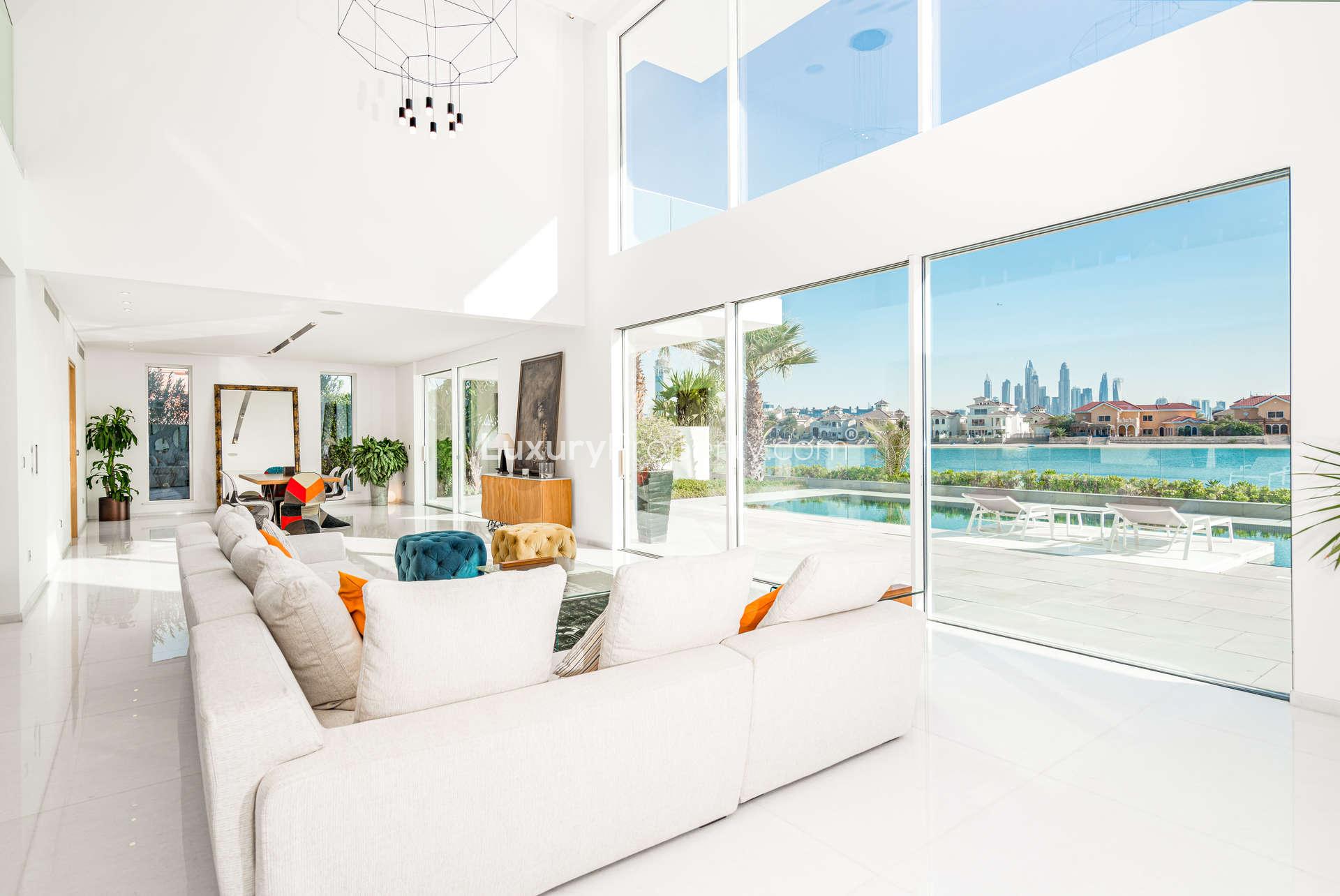 Walk-in closet with island and vanity in Palm Jumeirah villa, Dubai