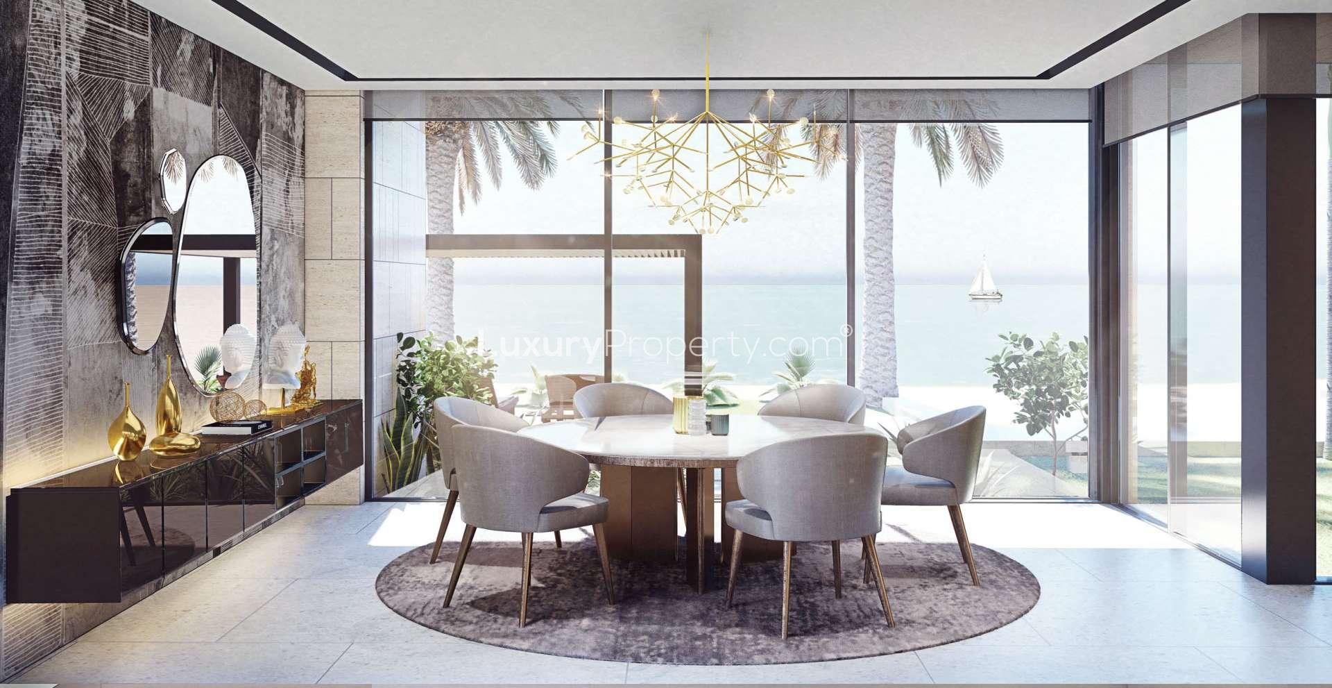 Luxurious living room in 5-bedroom villa, Palm Jumeirah, overlooking sea with modern decor
