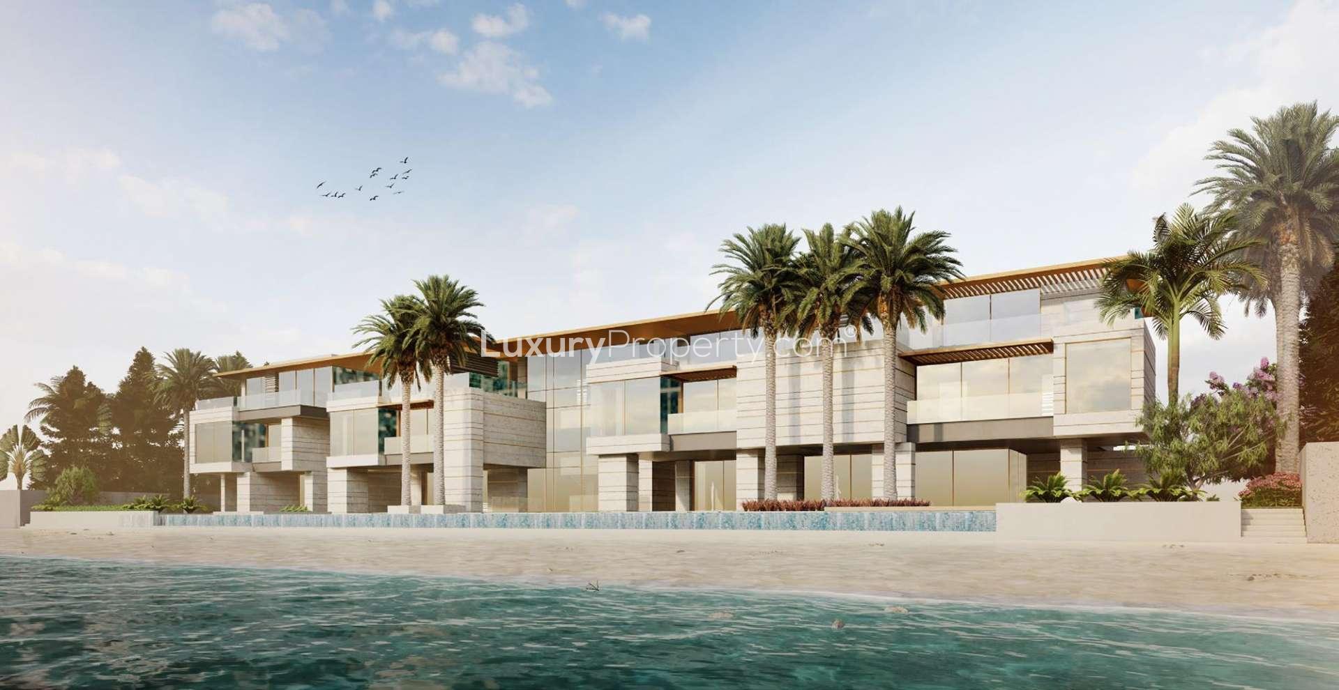 Luxurious 8-bedroom villa exterior on Palm Jumeirah's Billionaire's Row, Dubai, at night