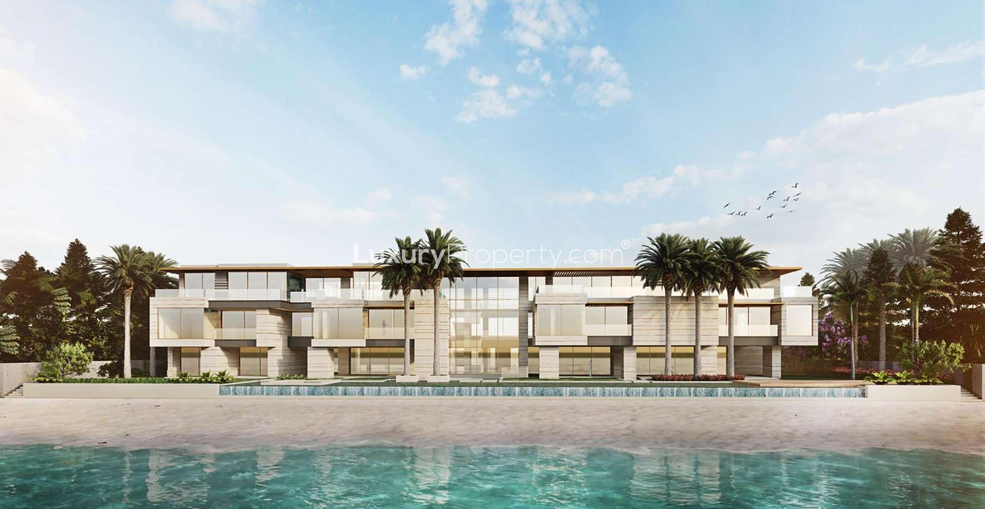 Bespoke villa with waterfront view on Palm Jumeirah's Billionaire's Row, Dubai skyline visible