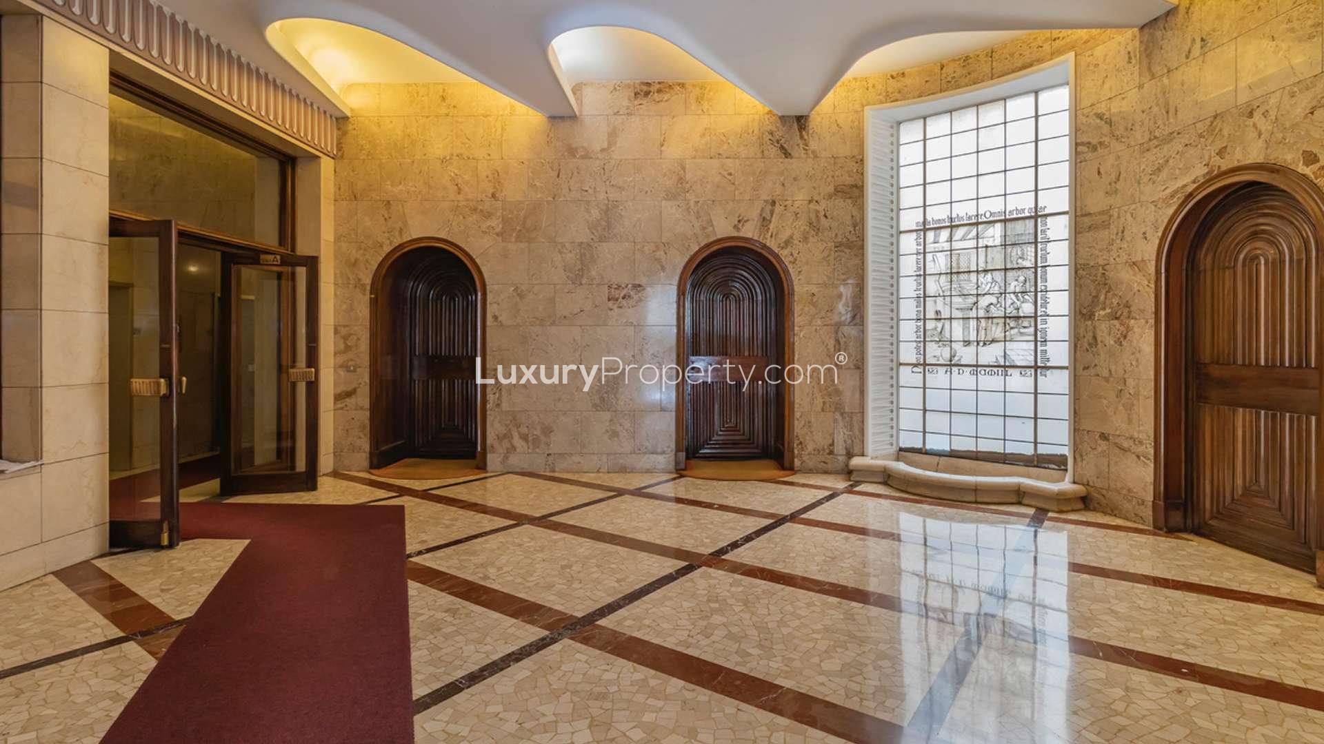Exterior view of luxury apartment building on Via Serbelloni, Milan, available for sale