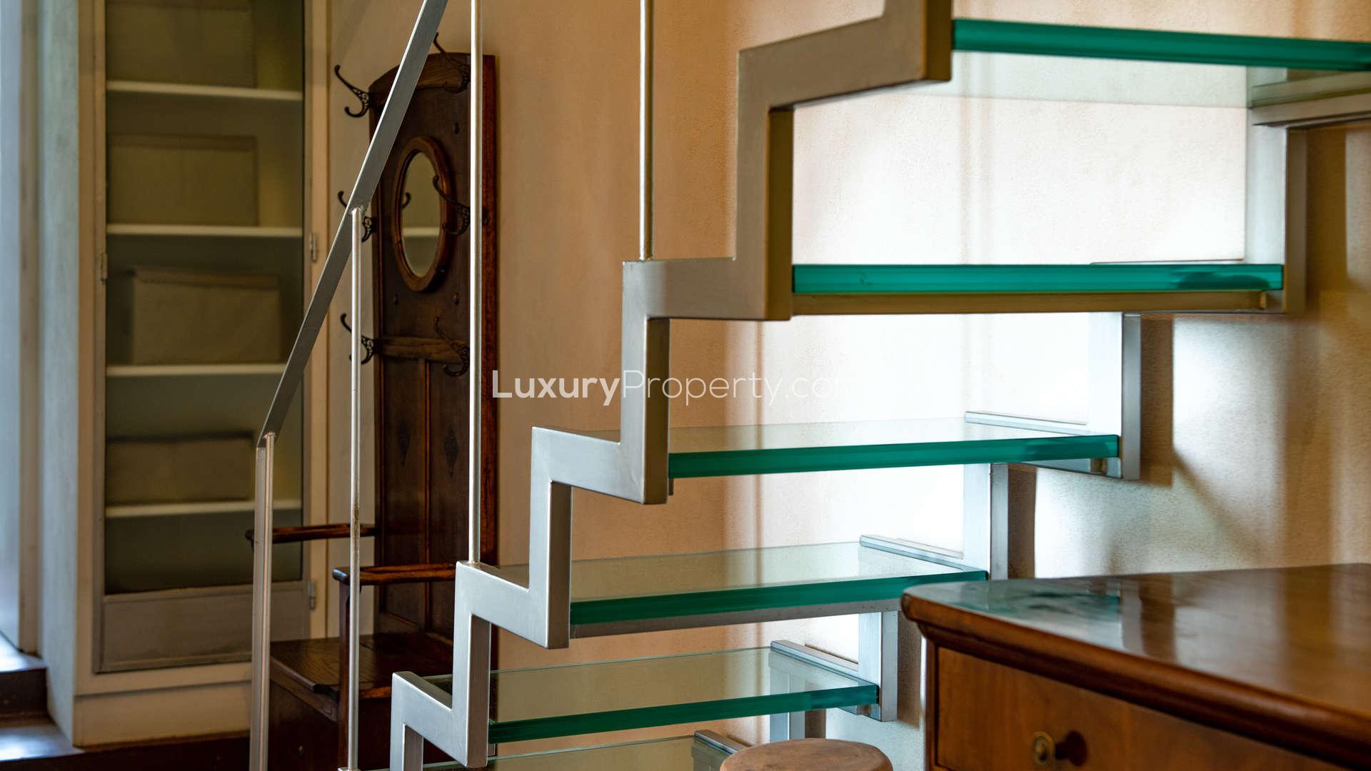 Spiral staircase and rustic stone walls in Tuscan villa, Villa Nobile, Florence