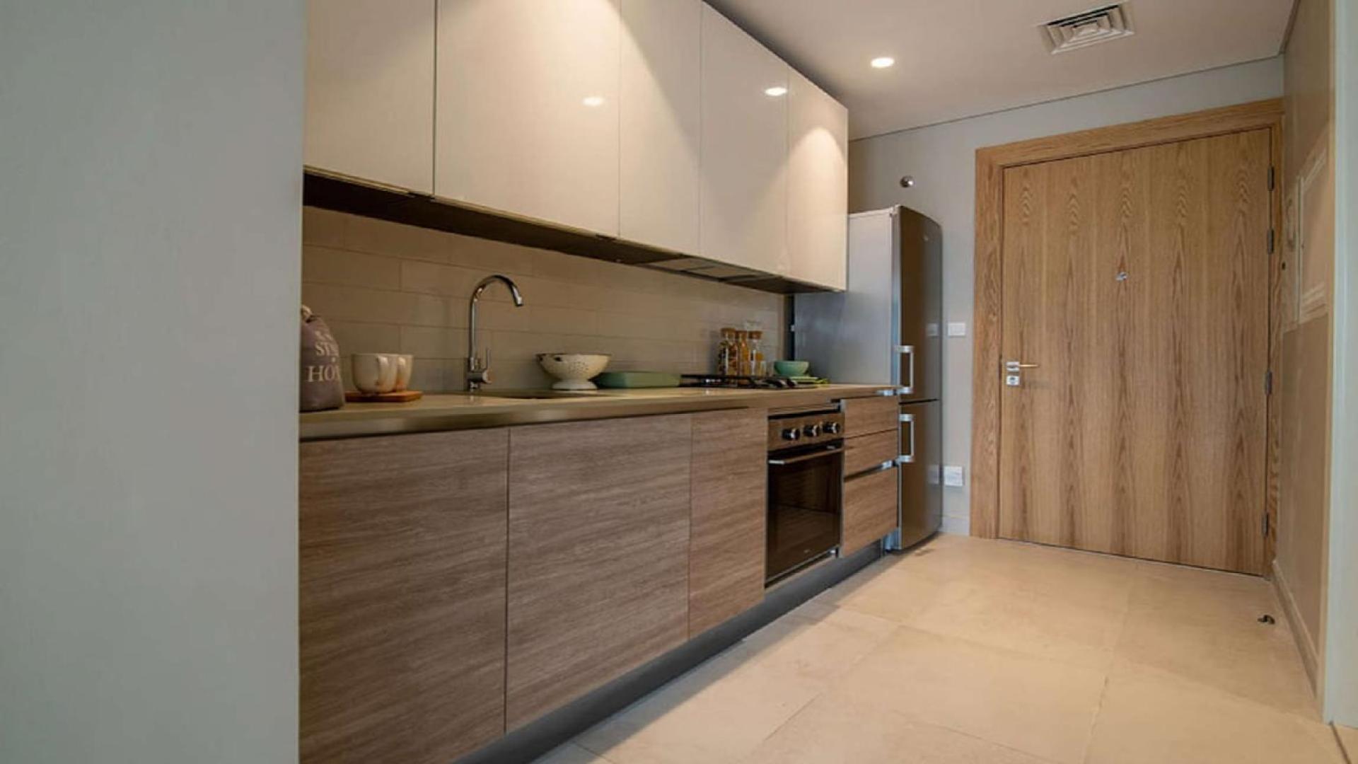 Fully furnished studio apartment interior at Olivara Residences, Dubai Studio City for rent