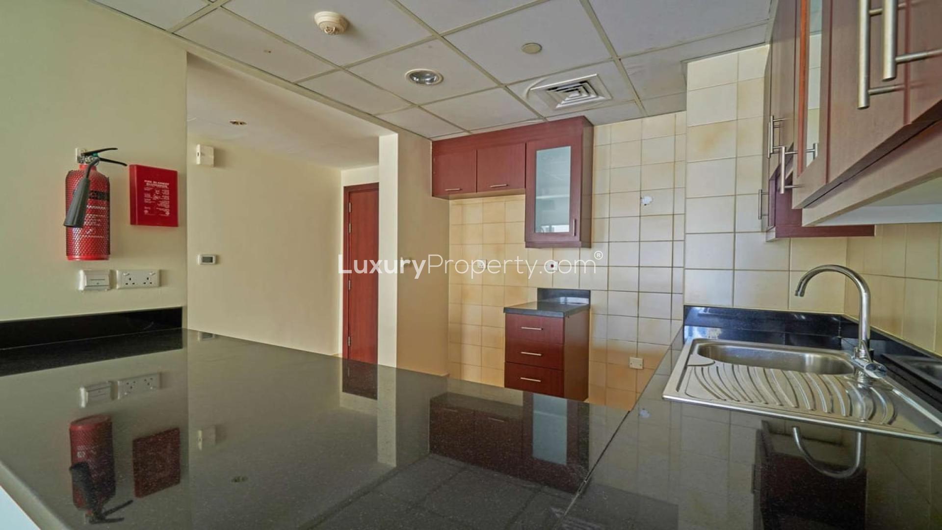 Mid-floor studio apartment interior with balcony view near Jumeirah Beach Walk, Murjan