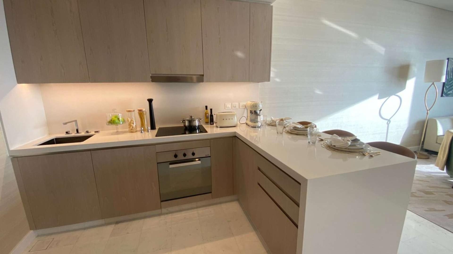 Furnished studio apartment living area in The Palm Tower, Palm Jumeirah, for rent