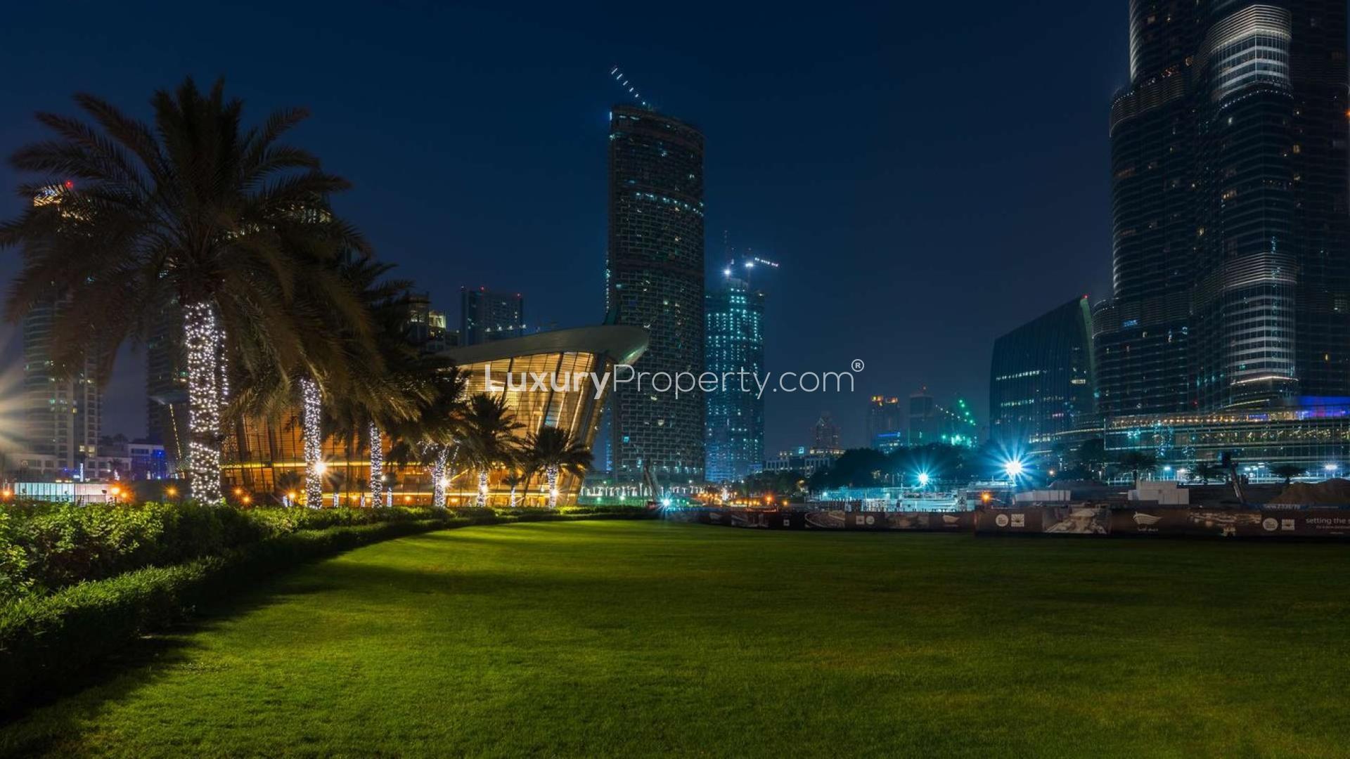 Sunset view of Downtown Dubai skyline near Opera District, featuring modern high-rise buildings