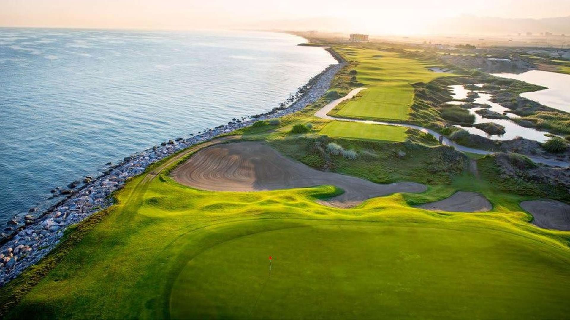 Modern apartment buildings with fountains at Tilal Al Ghaf, Dubai, for sale