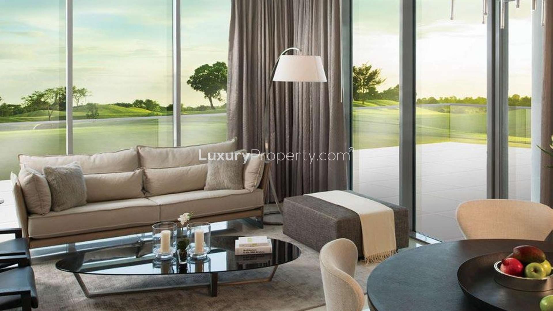 Serviced studio apartment living area with scenic view in Akoya Oxygen, Dubailand