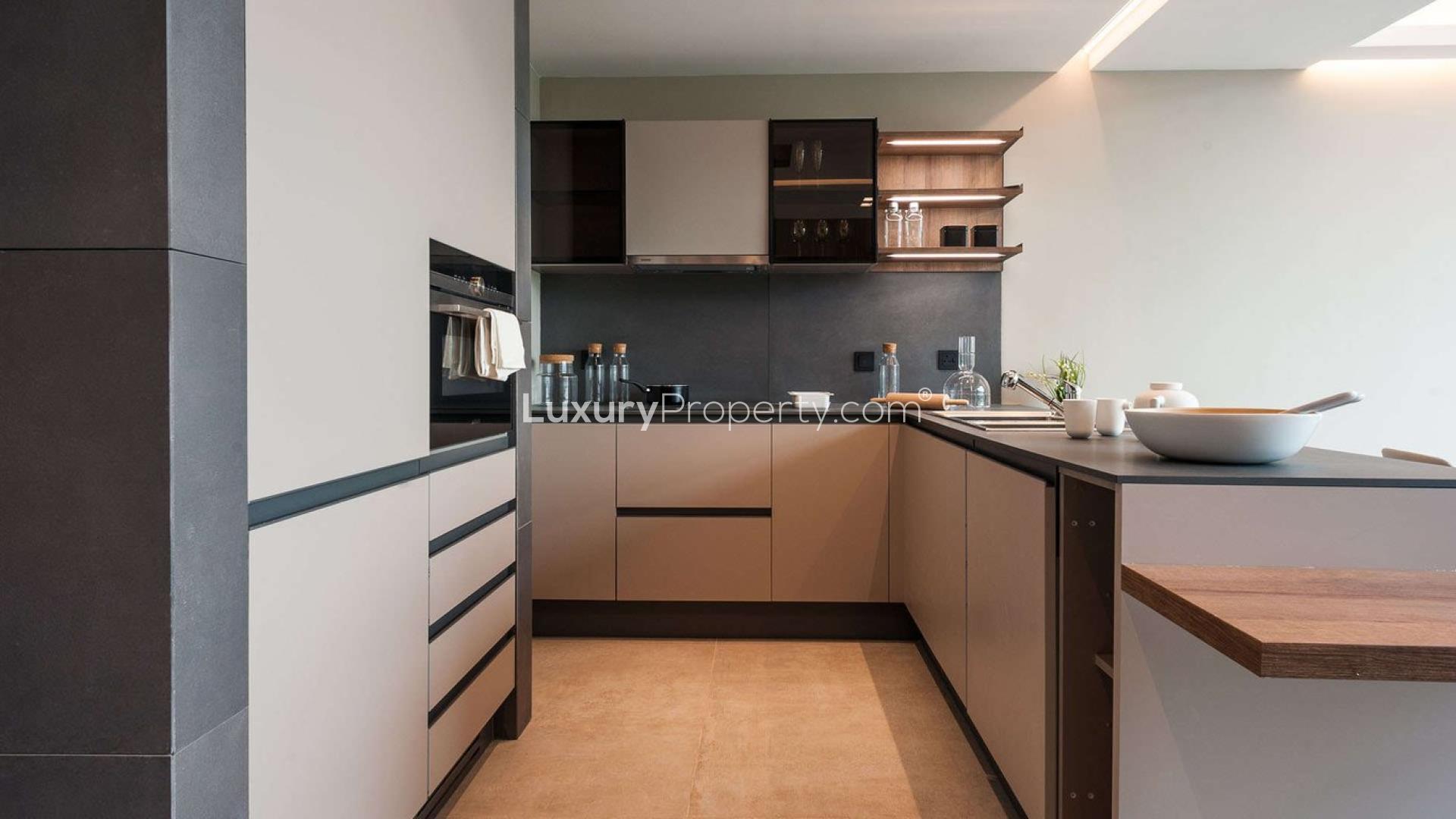Modern studio apartment interior in The Terraces, MBR City, featuring open-plan living space