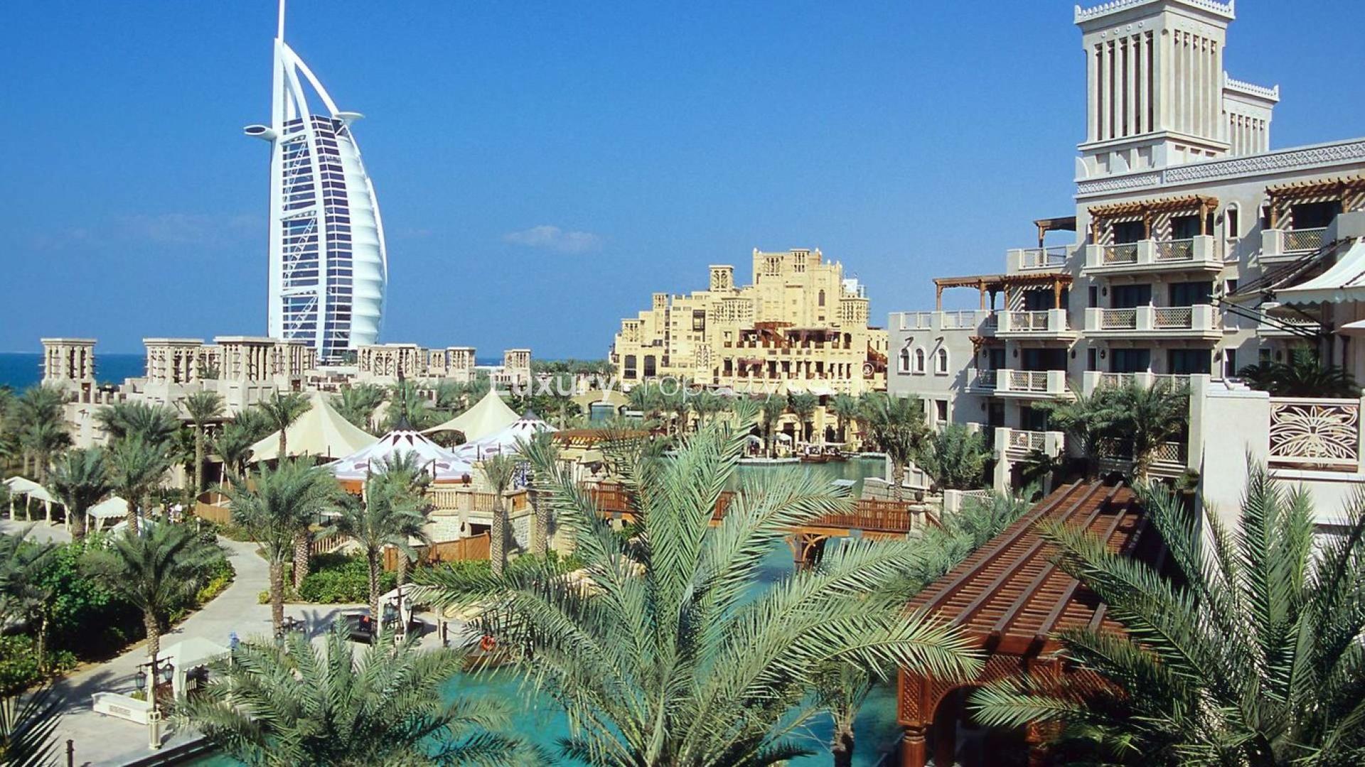 Aerial view of Burj Jumeira at sunset in Jumeirah, Dubai, showcasing city skyline