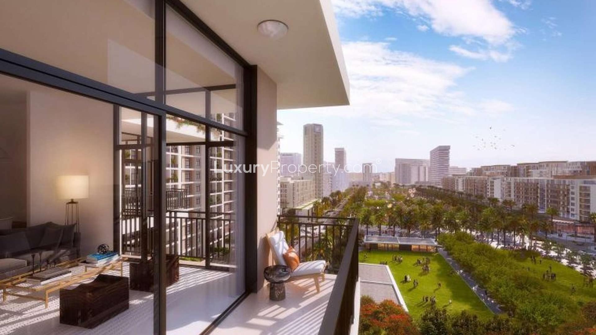 Modern living room in Dubai Town Square Rawda Apartments, featuring elegant decor and balcony view