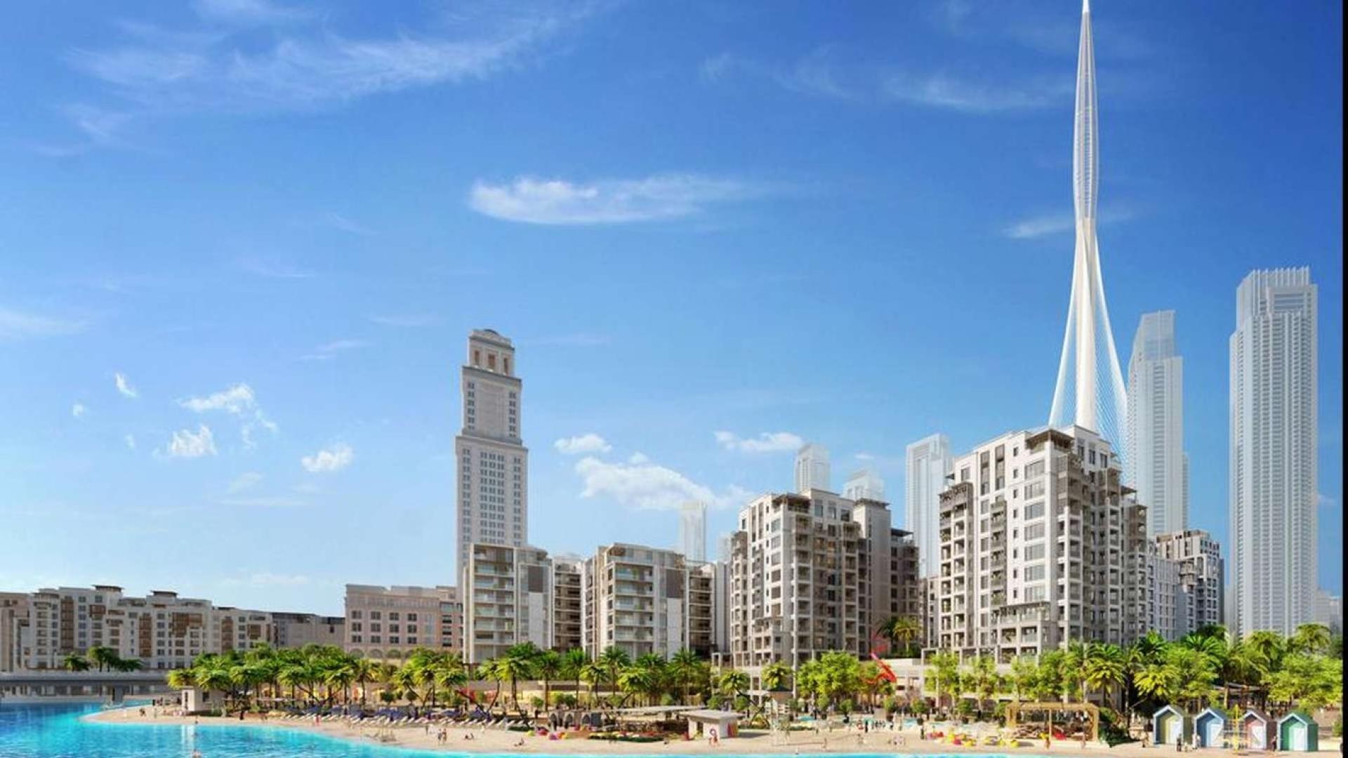 Luxury studio apartments at Creek Beach, Dubai Creek Harbour, surrounded by modern architecture and greenery