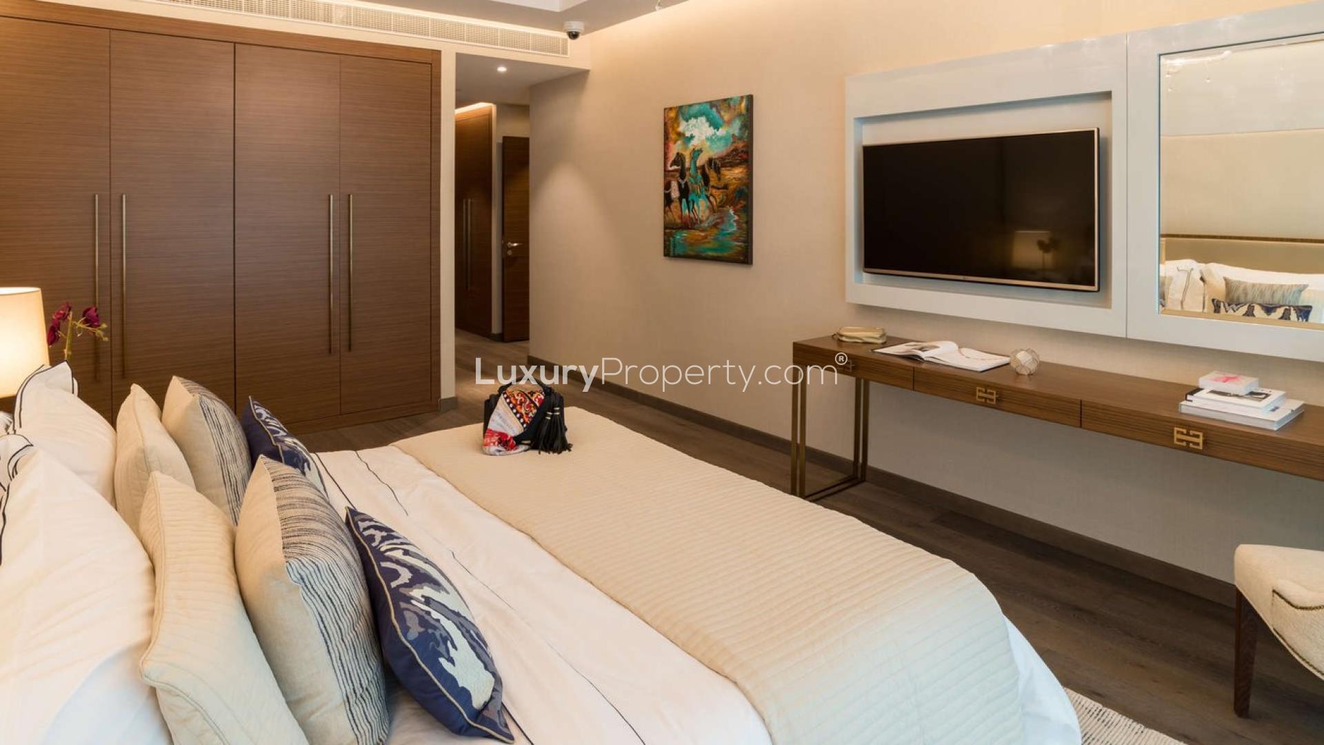 Modern studio apartment interior in Imperial Avenue, Downtown Dubai with elegant dining and kitchen area