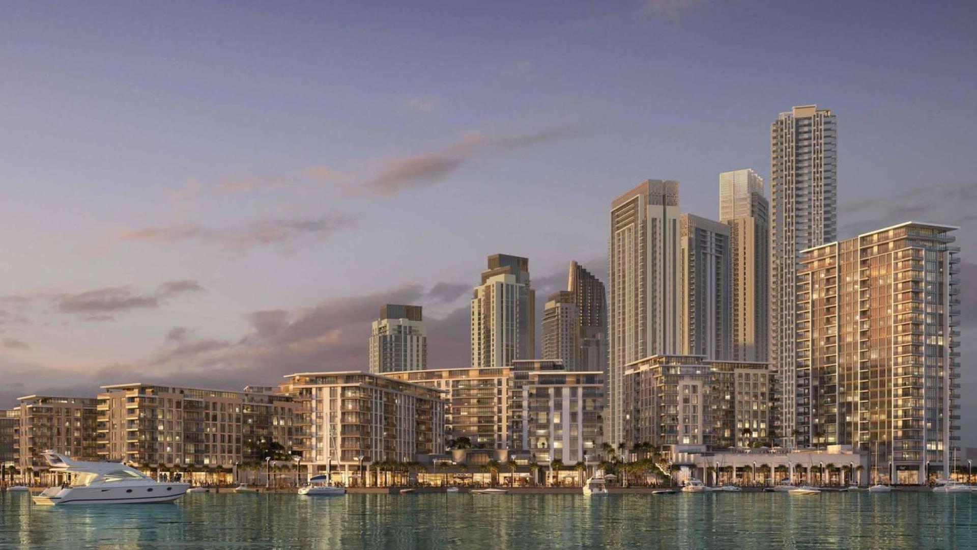 Modern apartment buildings and waterfront view at The Cove, Dubai Creek Harbour