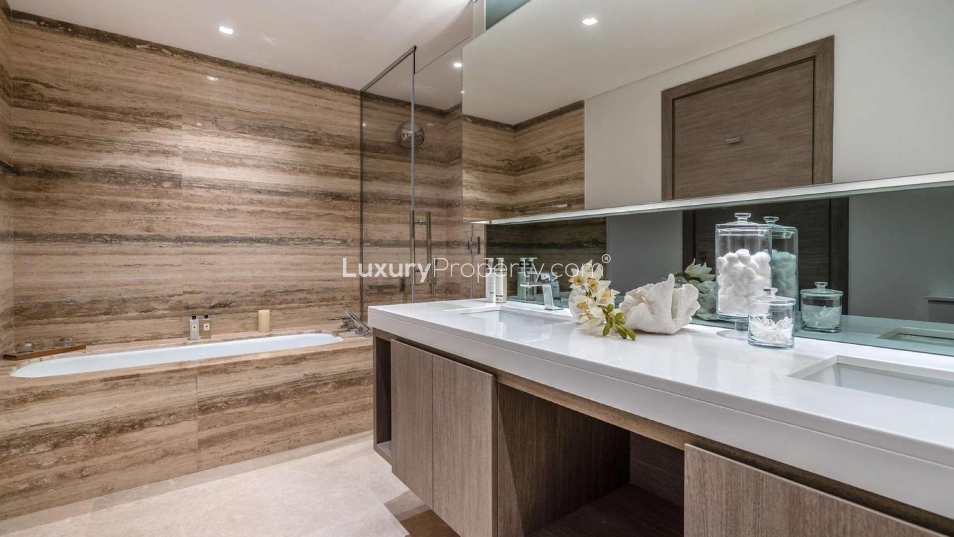 Modern living and dining area in three-bedroom apartment at The Sterling, Business Bay