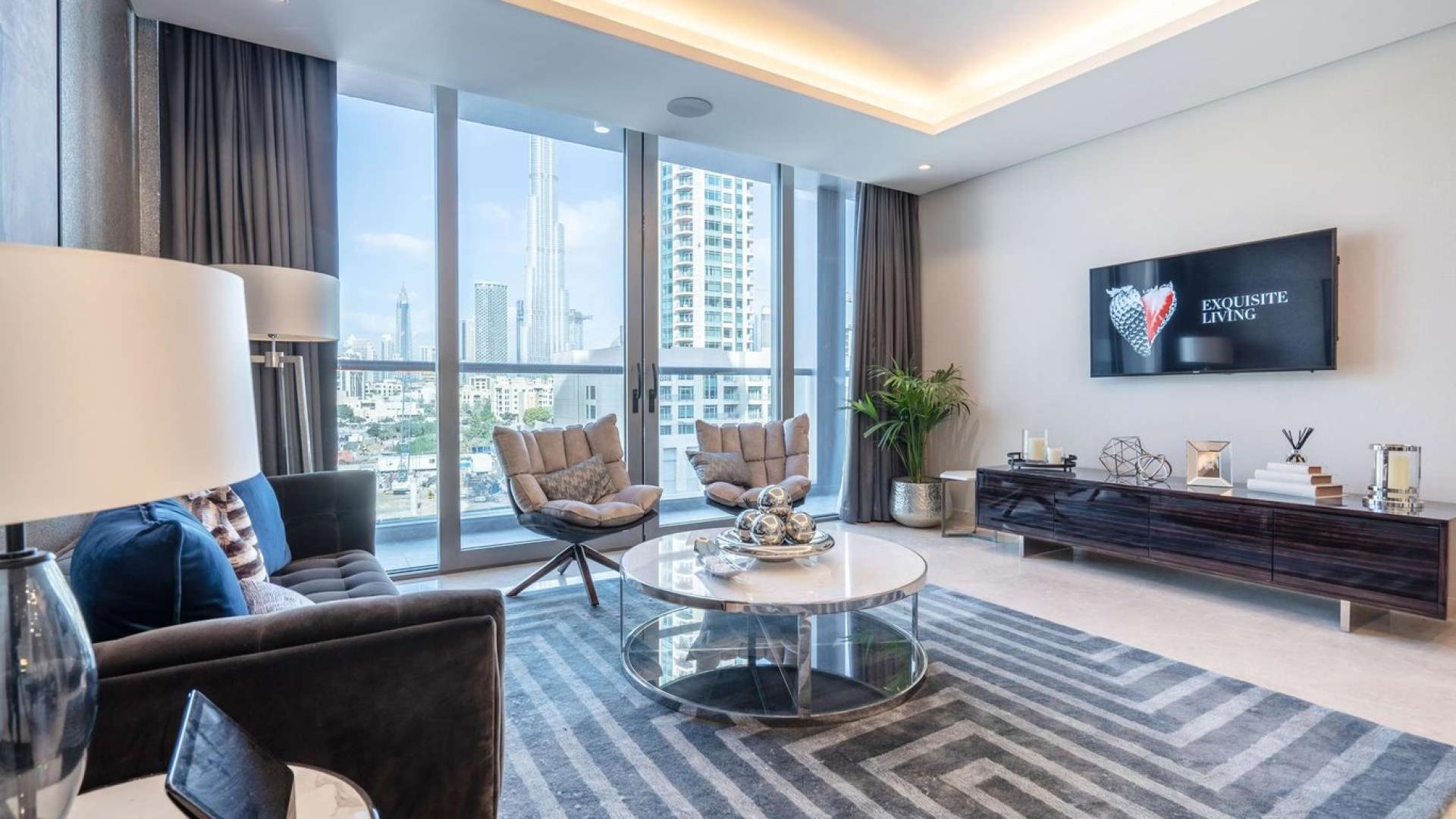 Luxury penthouse living room in The Sterling, Downtown Dubai with modern decor and city views