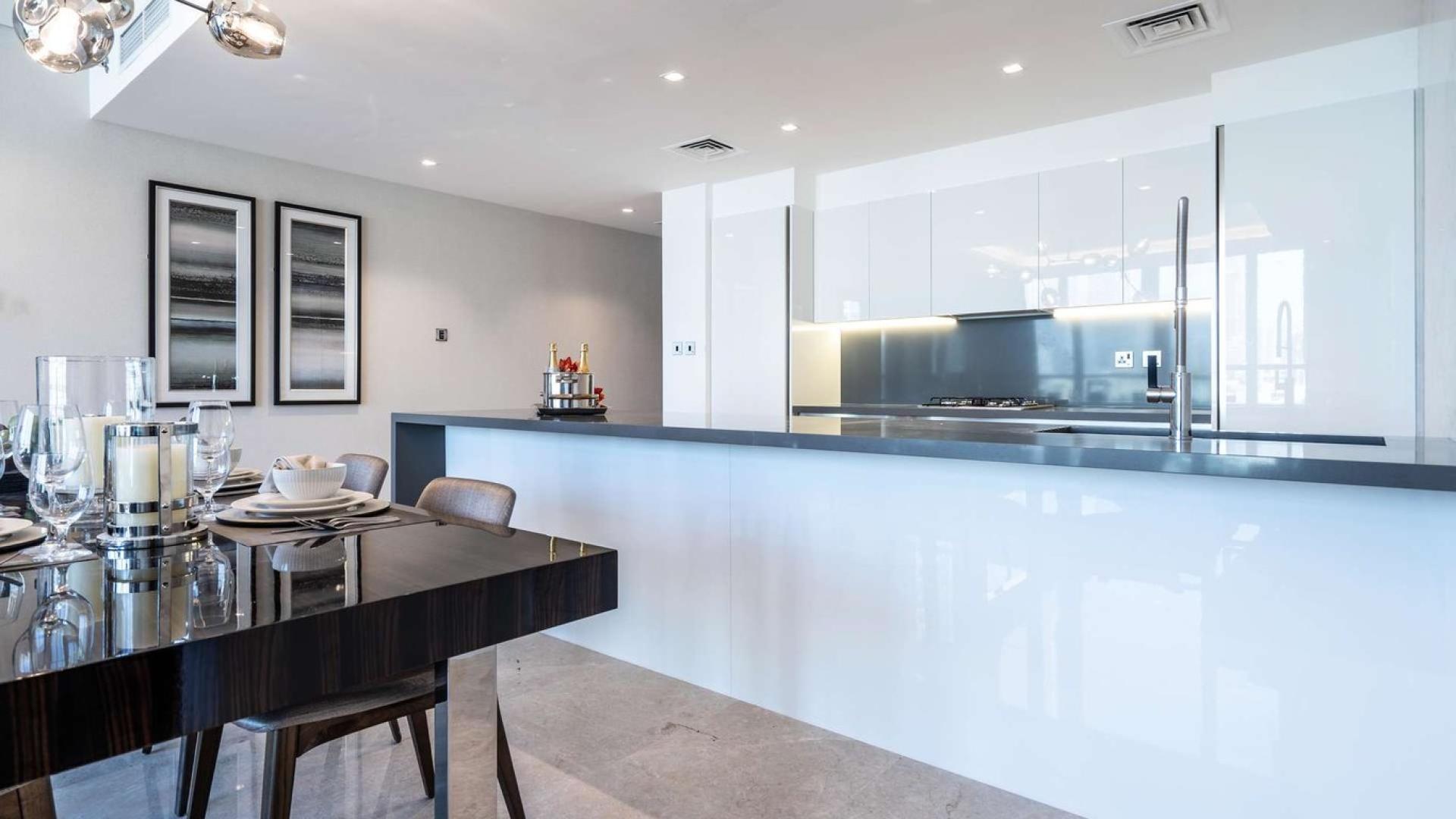 Ultramodern kitchen and living area in one-bedroom apartment, The Sterling, Business Bay