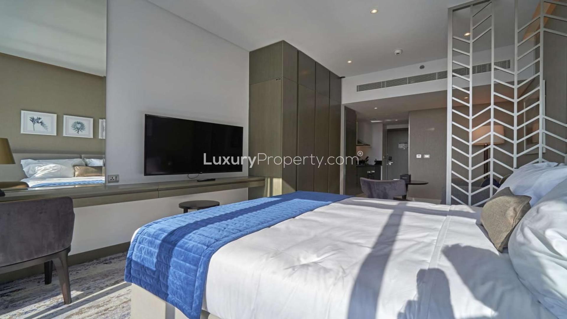 Furnished studio apartment interior in Damac Prive, Business Bay, with city view