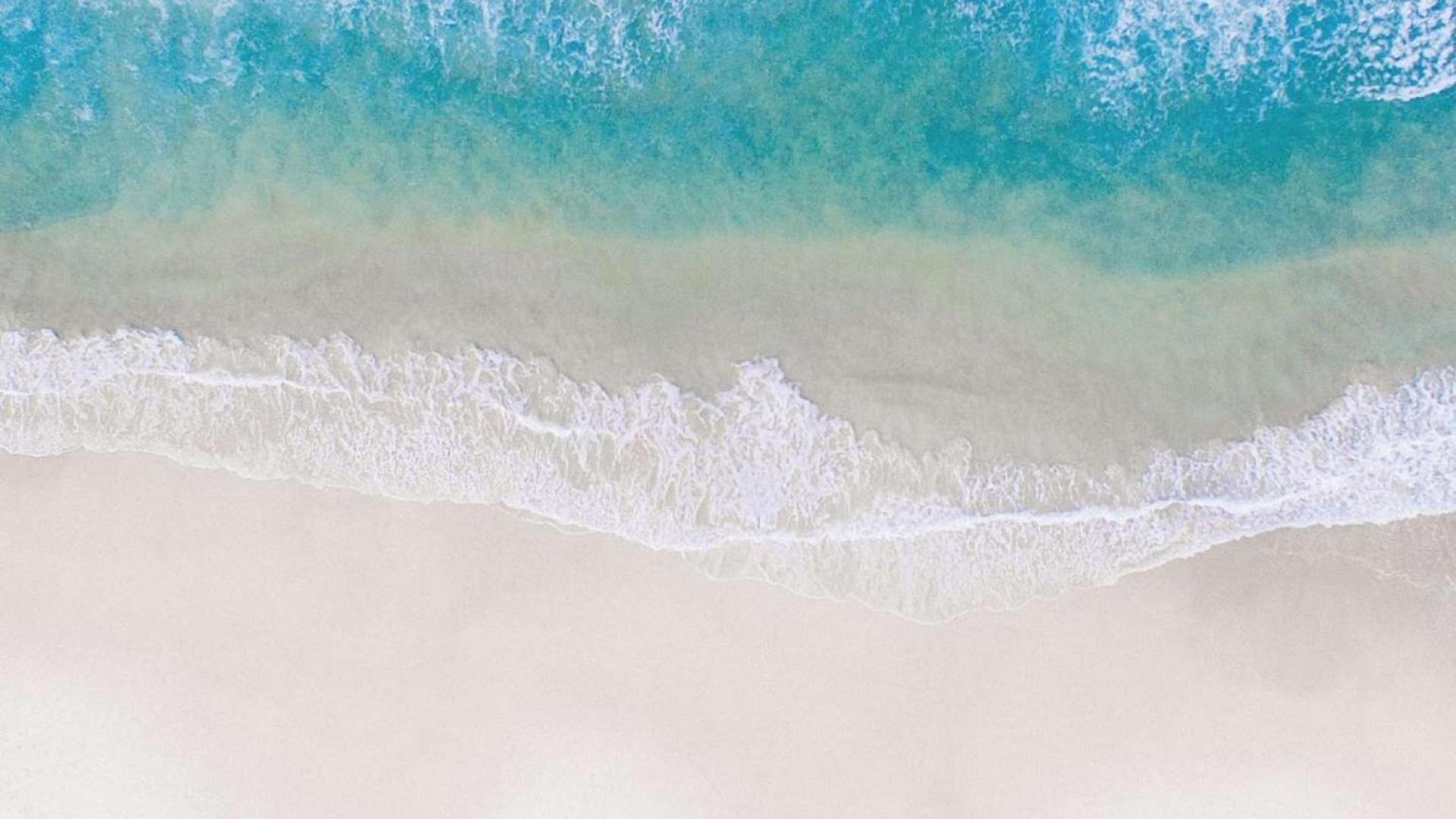 Night view of Palace Beach Residence apartment at Emaar Beachfront, Dubai Harbour skyline visible