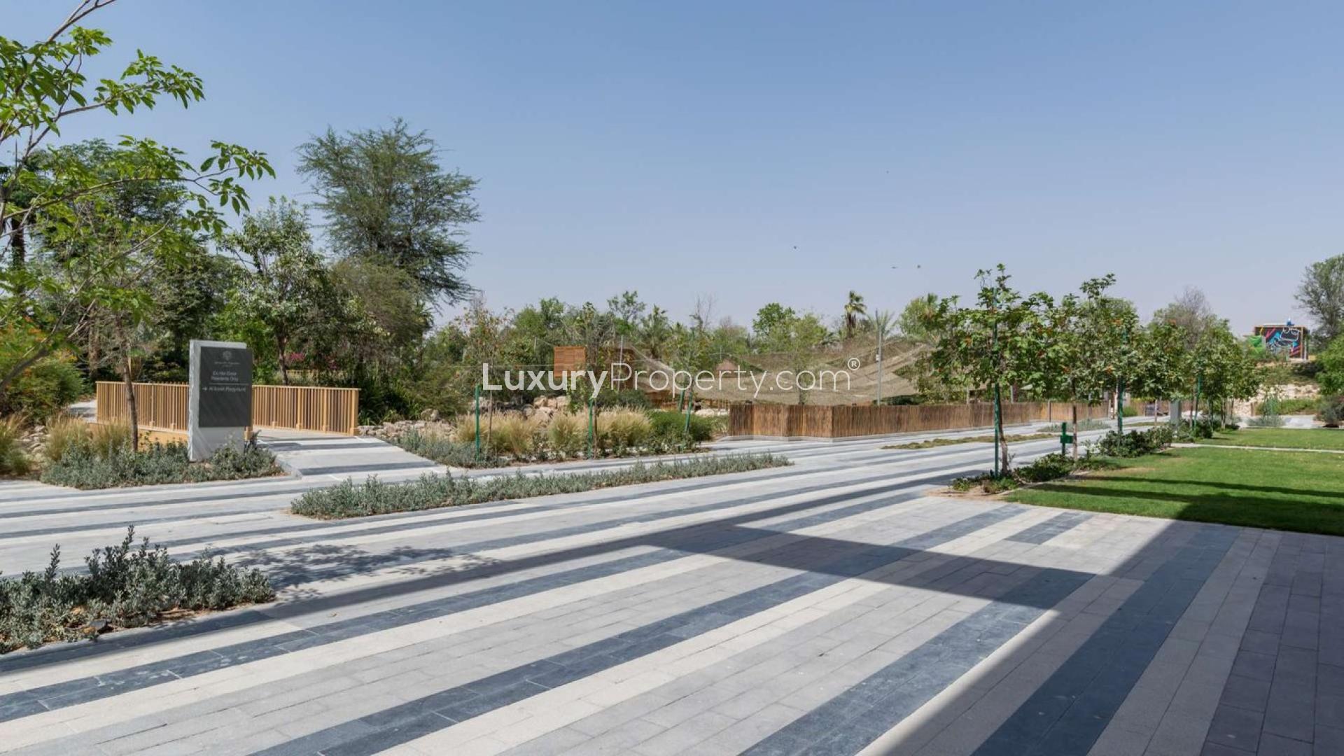 Modern studio apartment living room in Al Barari, The Neighbourhood, spacious and bright