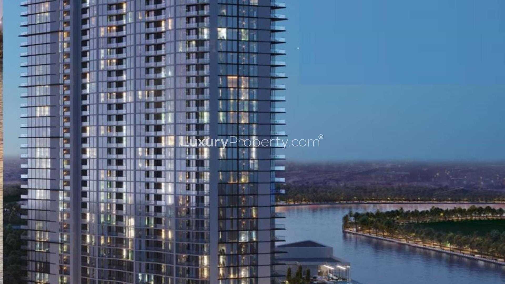 Modern studio apartment interior at Waves Grande, Sobha Hartland, overlooking waterfront, for sale