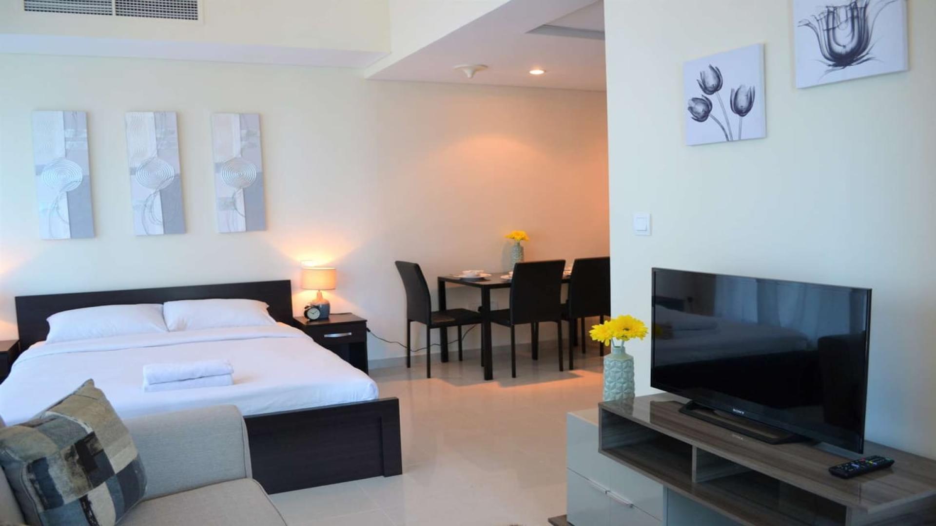 Charming studio apartment interior in Bay Central, Dubai Marina, featuring modern furnishings and decor