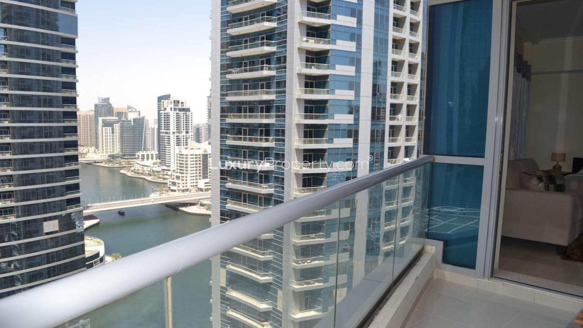 Balcony view from studio apartment in Bay Central, Dubai Marina, showcasing waterfront skyline