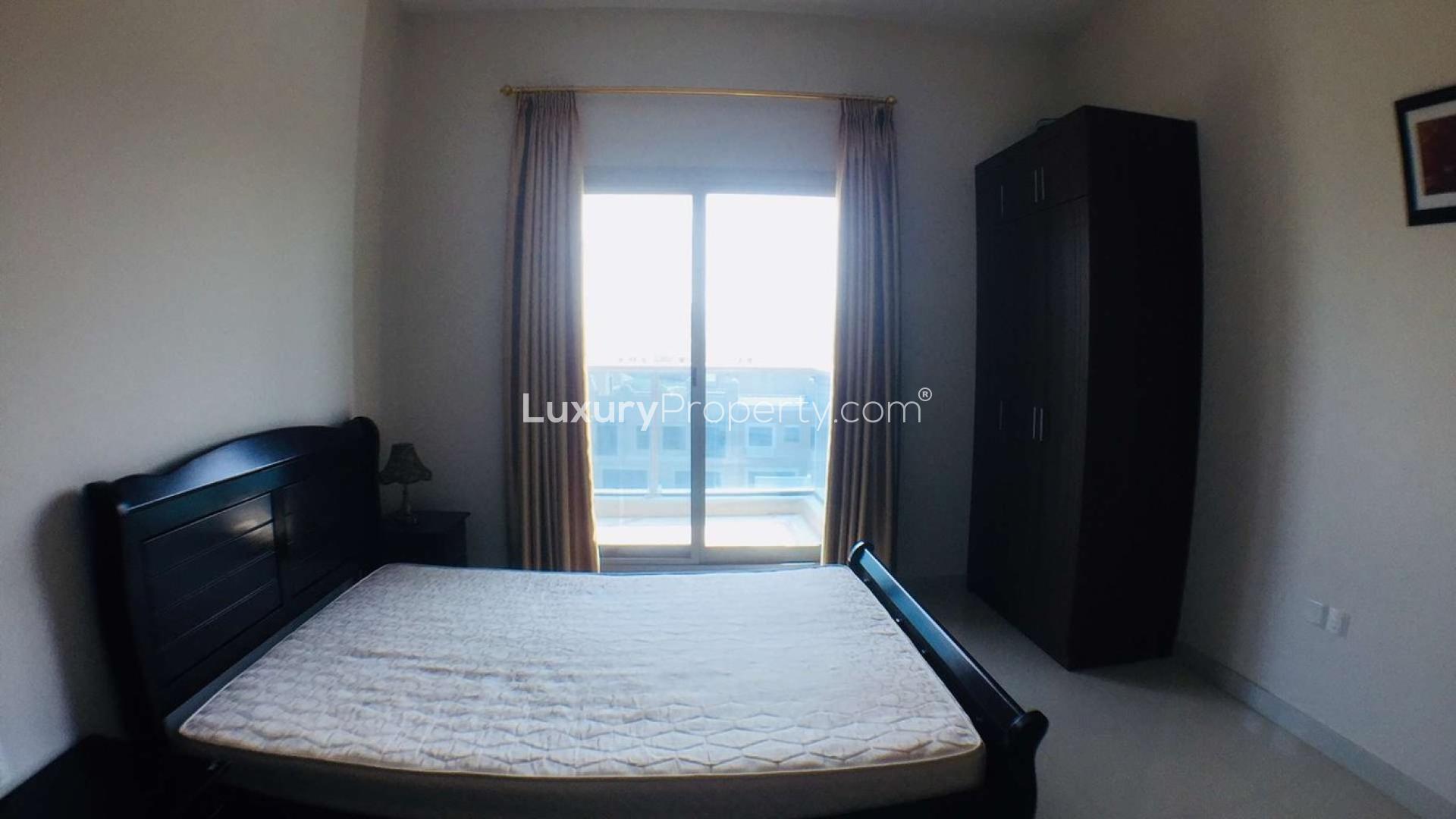 Studio apartment living area with kitchen, Elite Sports Residence, Dubai Sports City