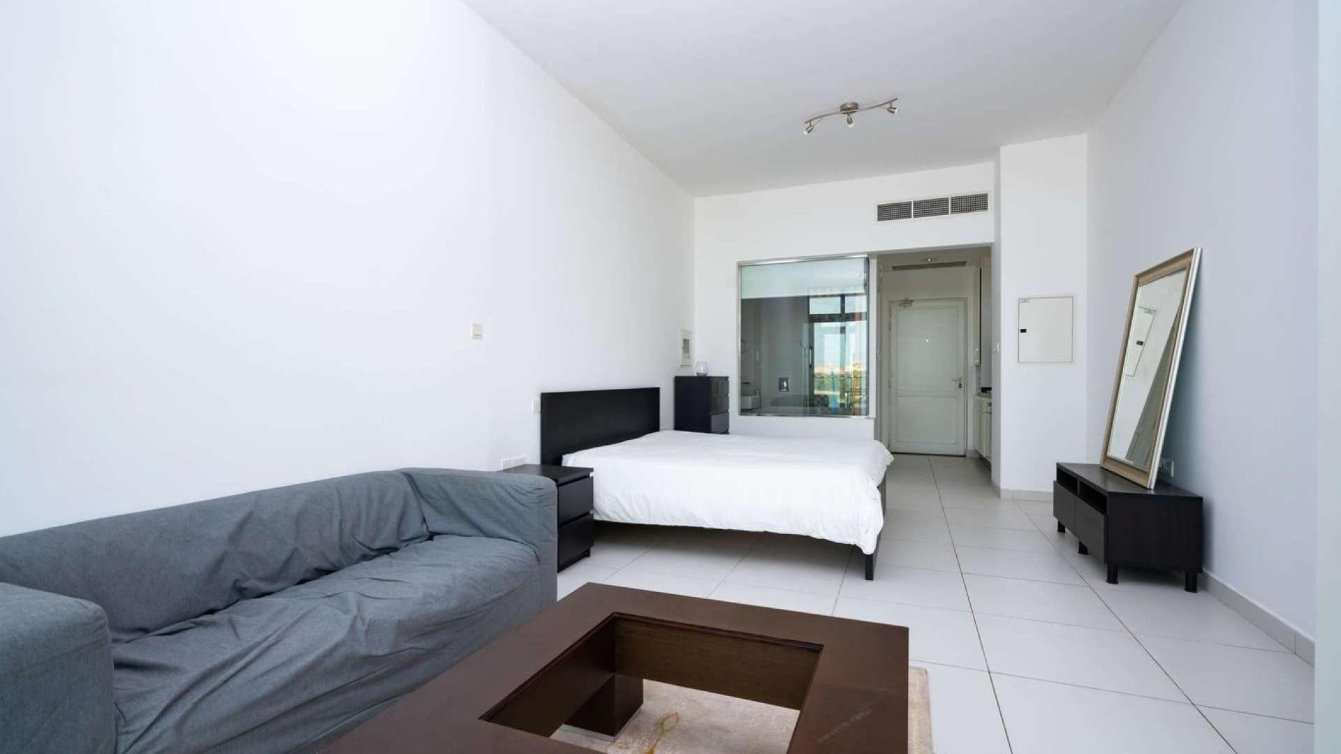 Studio apartment interior at Palm Views, Palm Jumeirah, featuring modern furnishings and decor