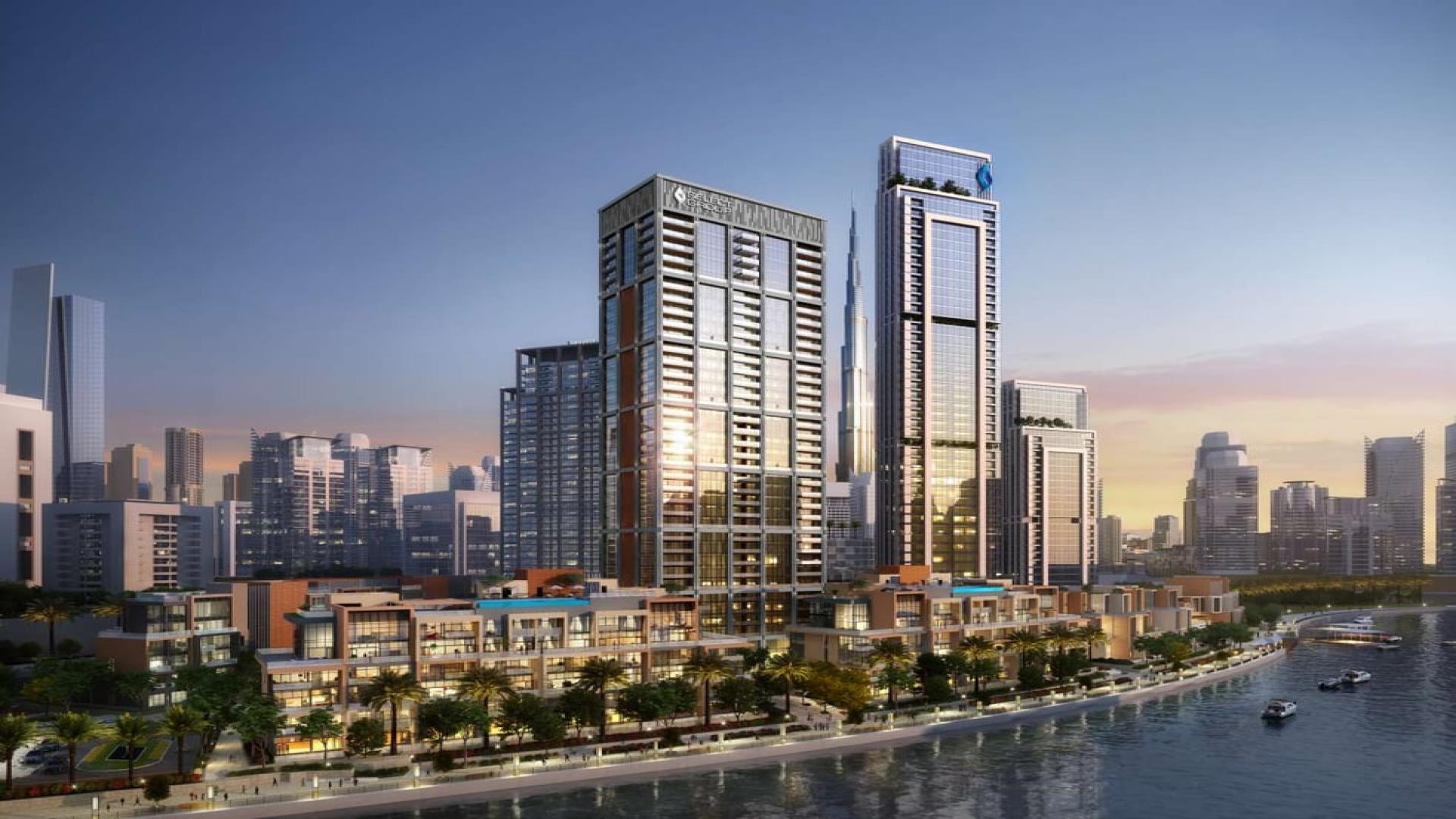 Modern kitchen and living area in waterfront 3-bedroom apartment, Business Bay Peninsula