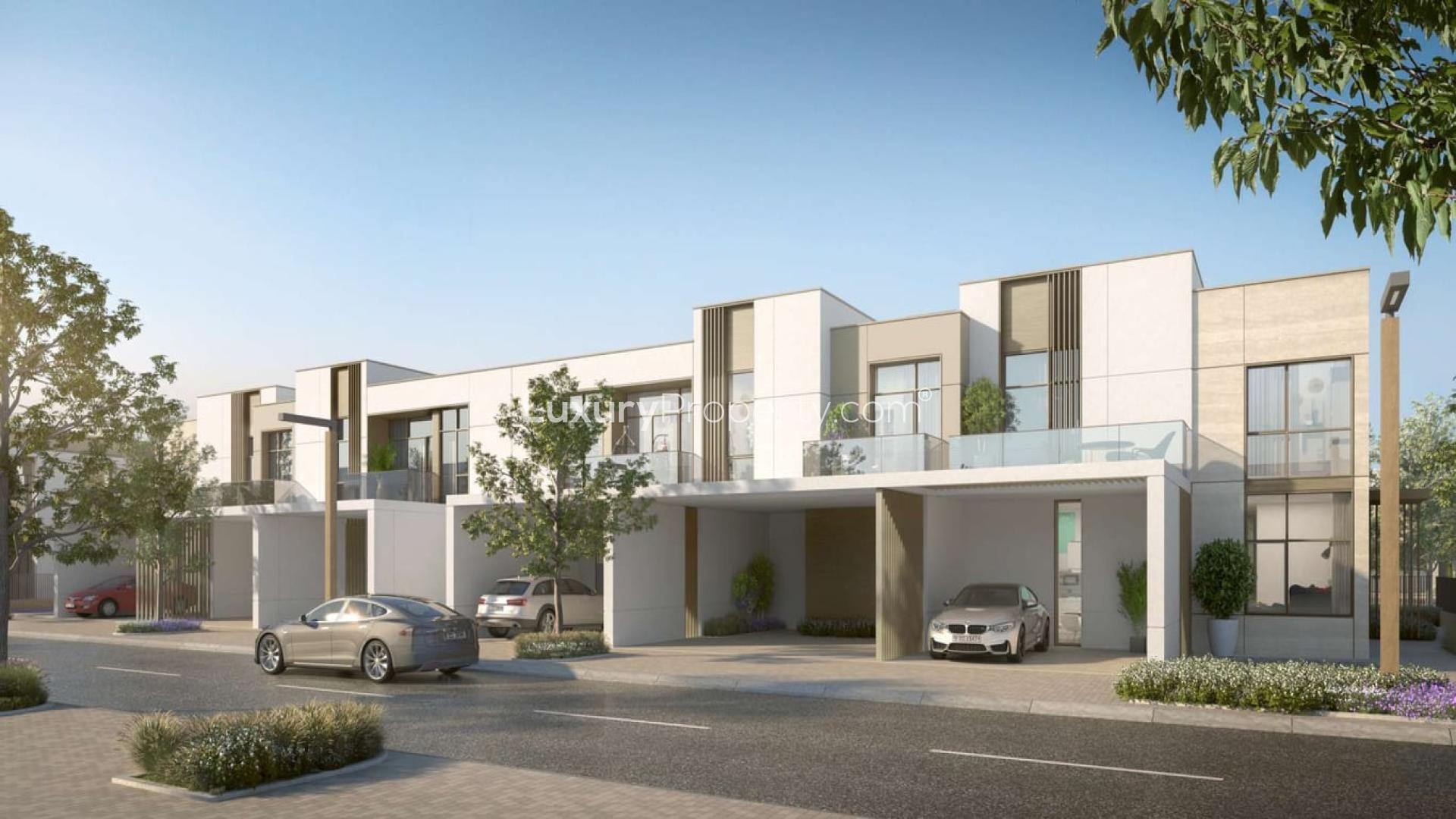 Modern townhouse exterior in Ruba, Arabian Ranches 3, featuring sleek design and carport