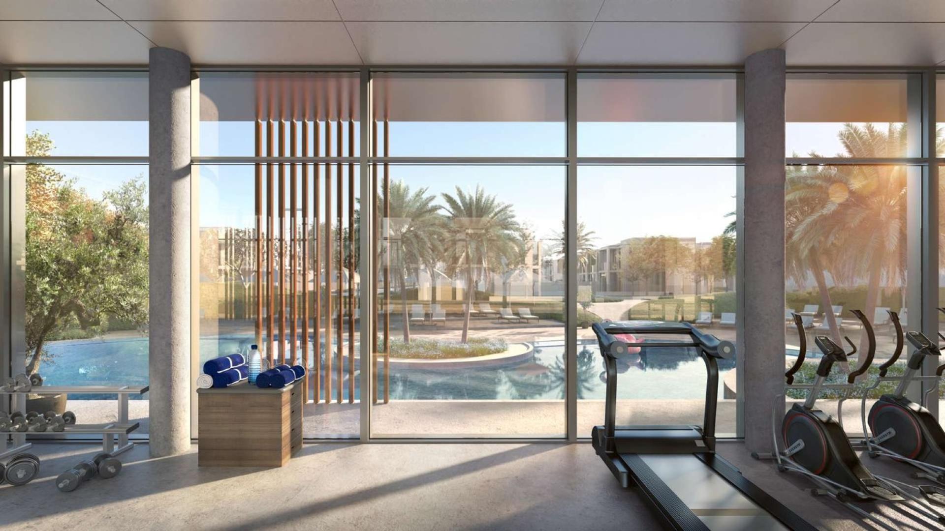 Modern townhouse in Arabian Ranches 3, Ruba community, featuring sleek design and lush landscaping