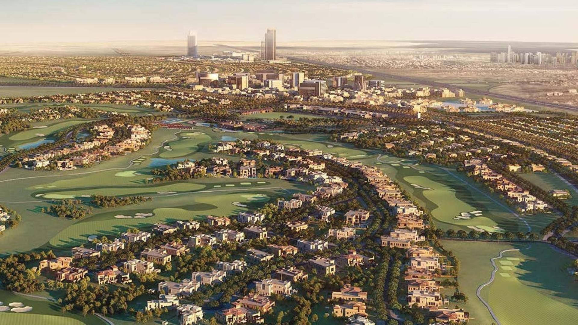 Prime plot entrance at Dubai Hills Estate with modern architecture and lush landscaping