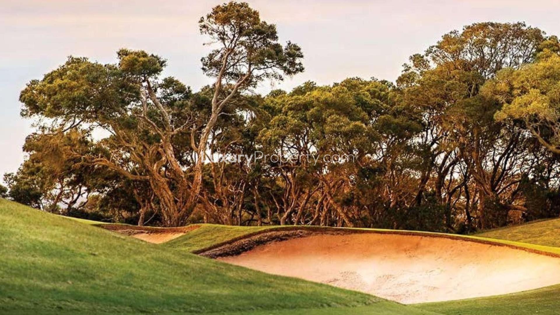 Aerial view of Dubai Hills Estate golf course and luxury villas for sale