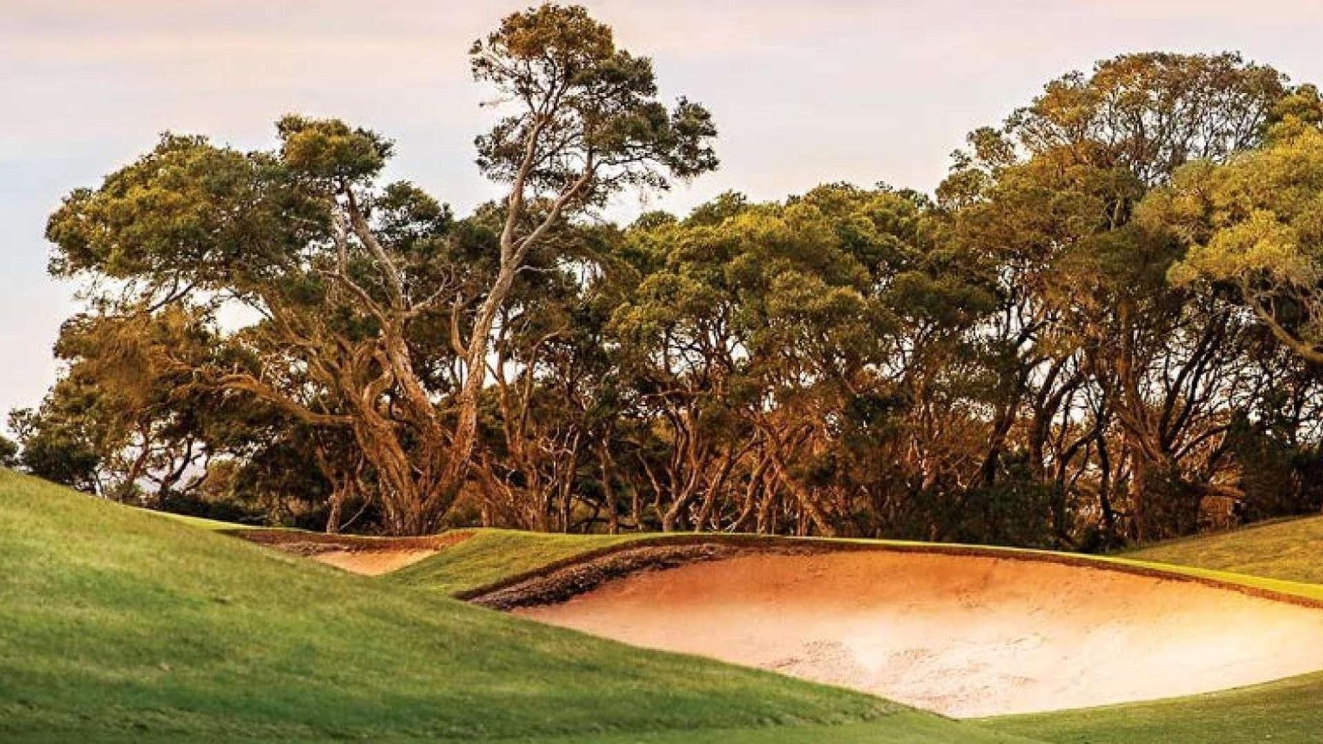 Aerial view of Dubai Hills Estate golf course and luxury villas for sale