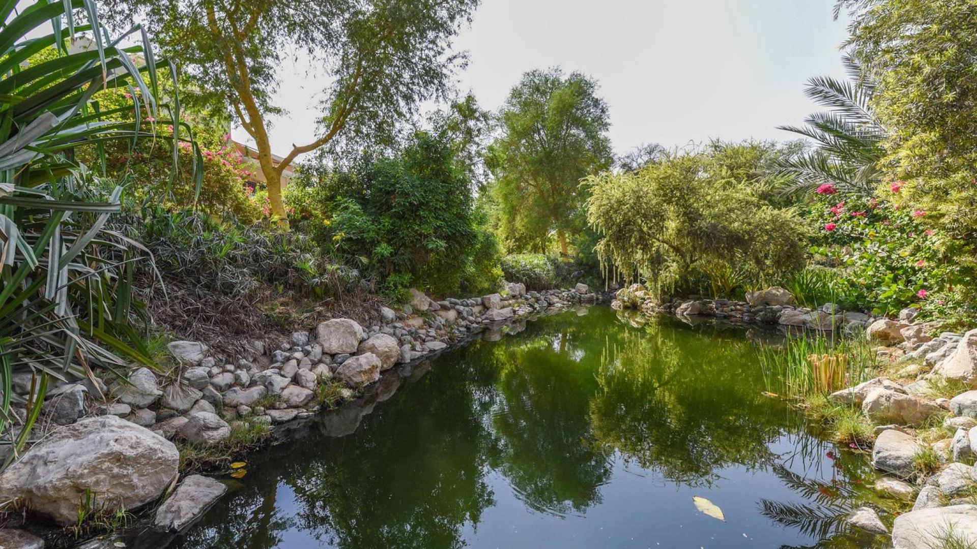 Sunny villa plot with lush greenery in Jasmine Leaf, Al Barari, Dubai