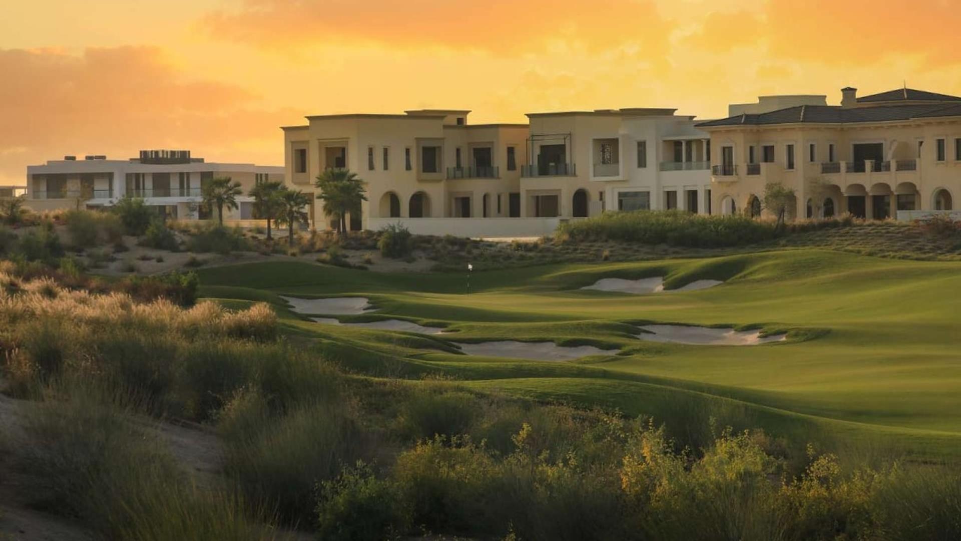 Alt text: "Emerald Hills large residential plot with scenic golf course view at sunset, Dubai Hills Estate.",Large plot for sale at Emerald Hills, Dubai Hills Estate, surrounded by lush greenery