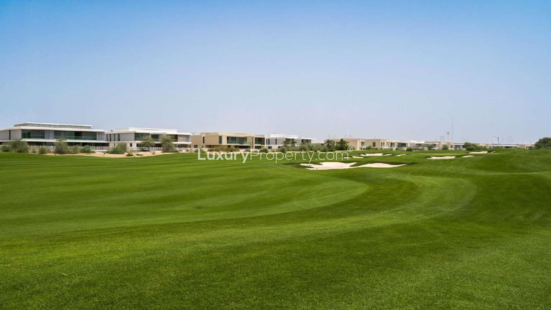 "Prime residential development plot with lush greenery in Dubai Hills Estate for sale.",Super Prime Residential Plot in Dubai Hills Estate with Lush Green Golf Course View