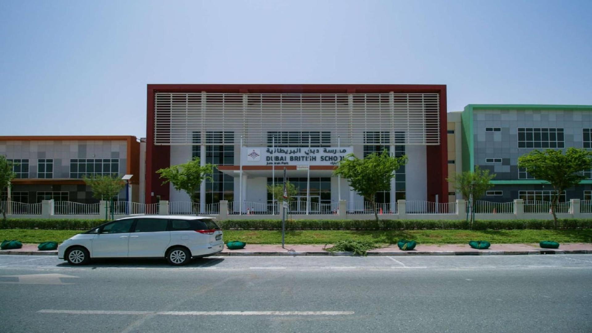 Jumeirah Park residential plot with view of nearby school building and street