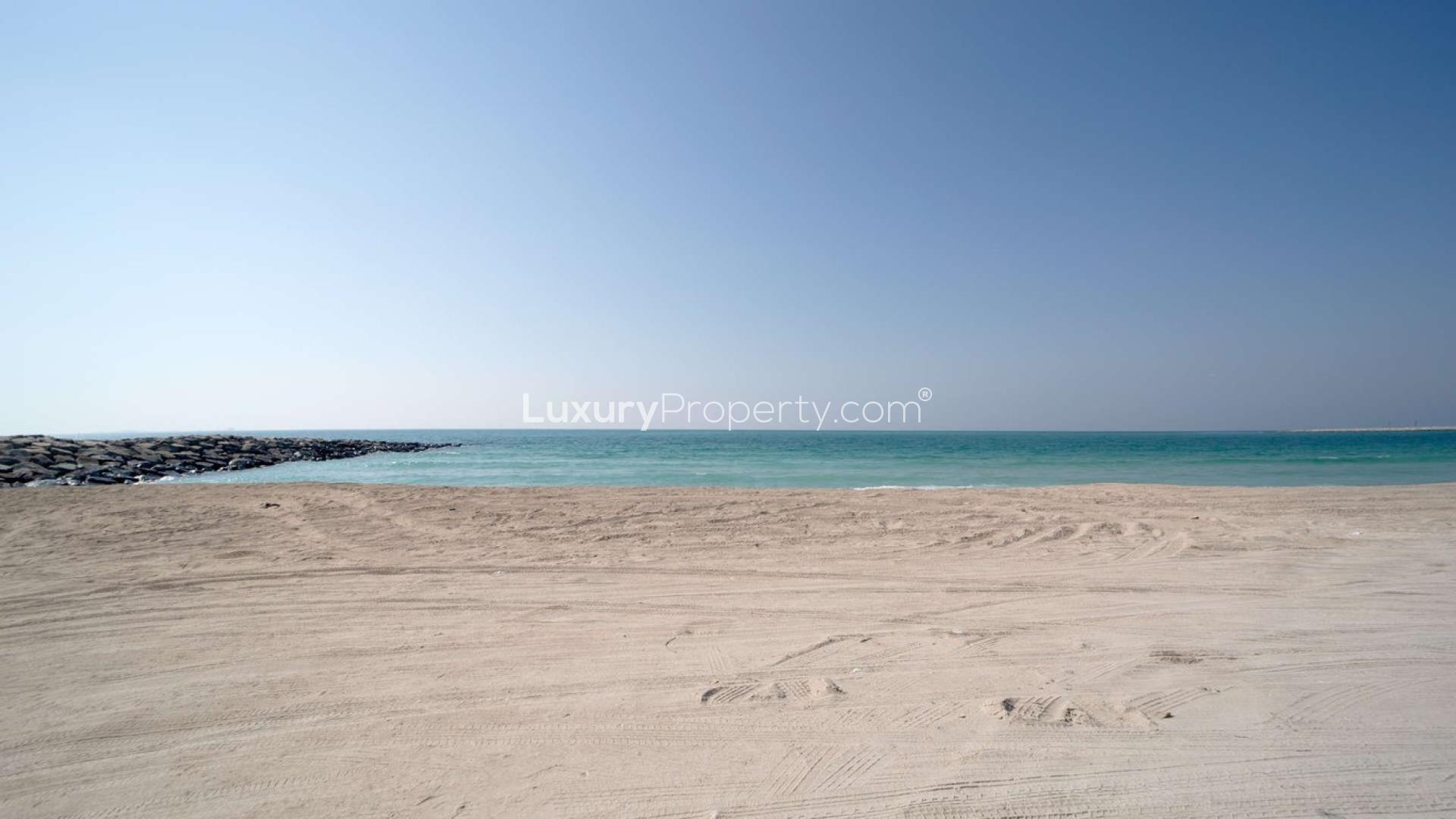 Stunning beachfront plot for sale on Jumeirah Bay Island with city skyline view
