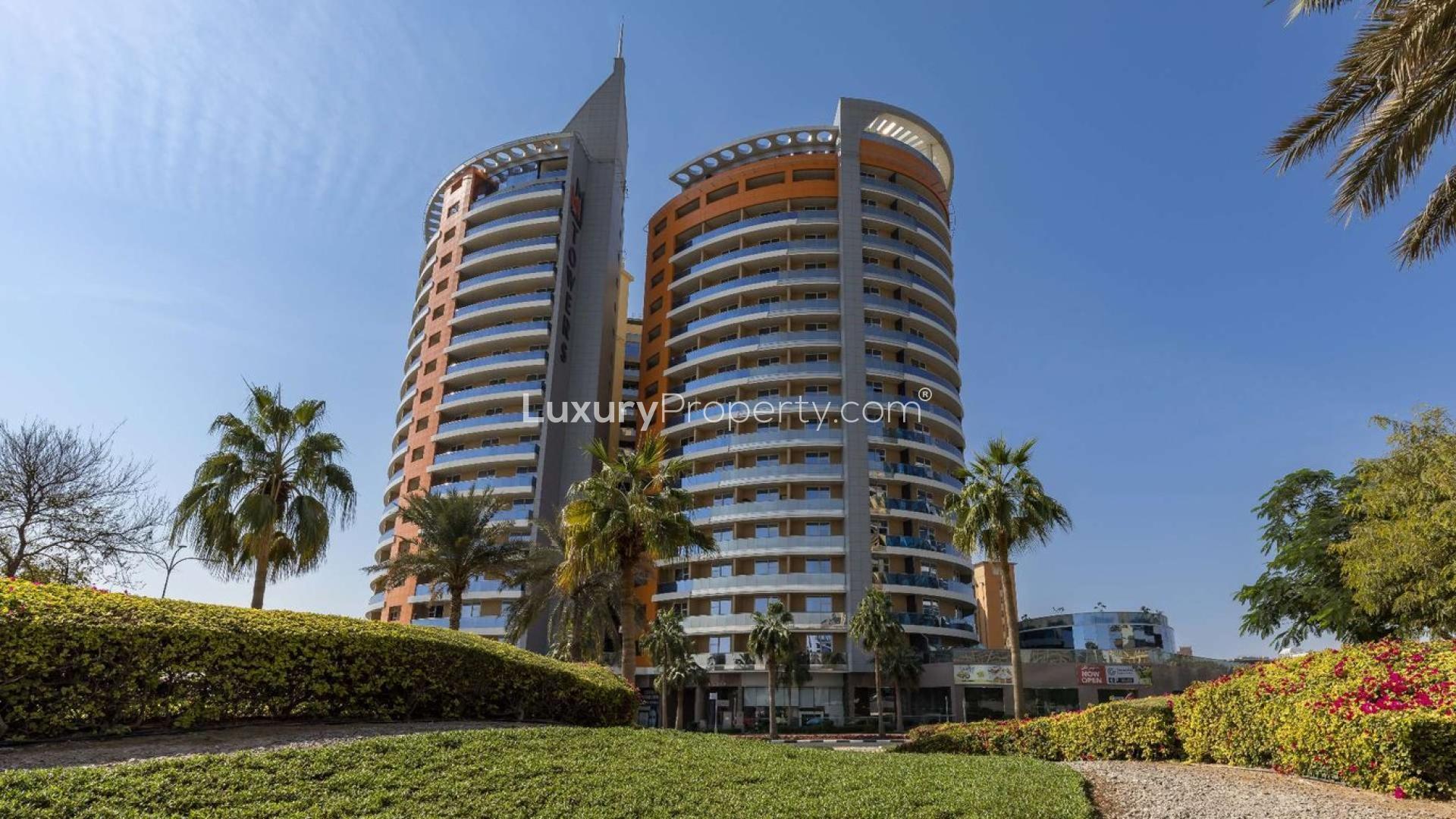 Twin-tower apartment building for sale in Dubai Silicon Oasis, MM Towers, lush surroundings