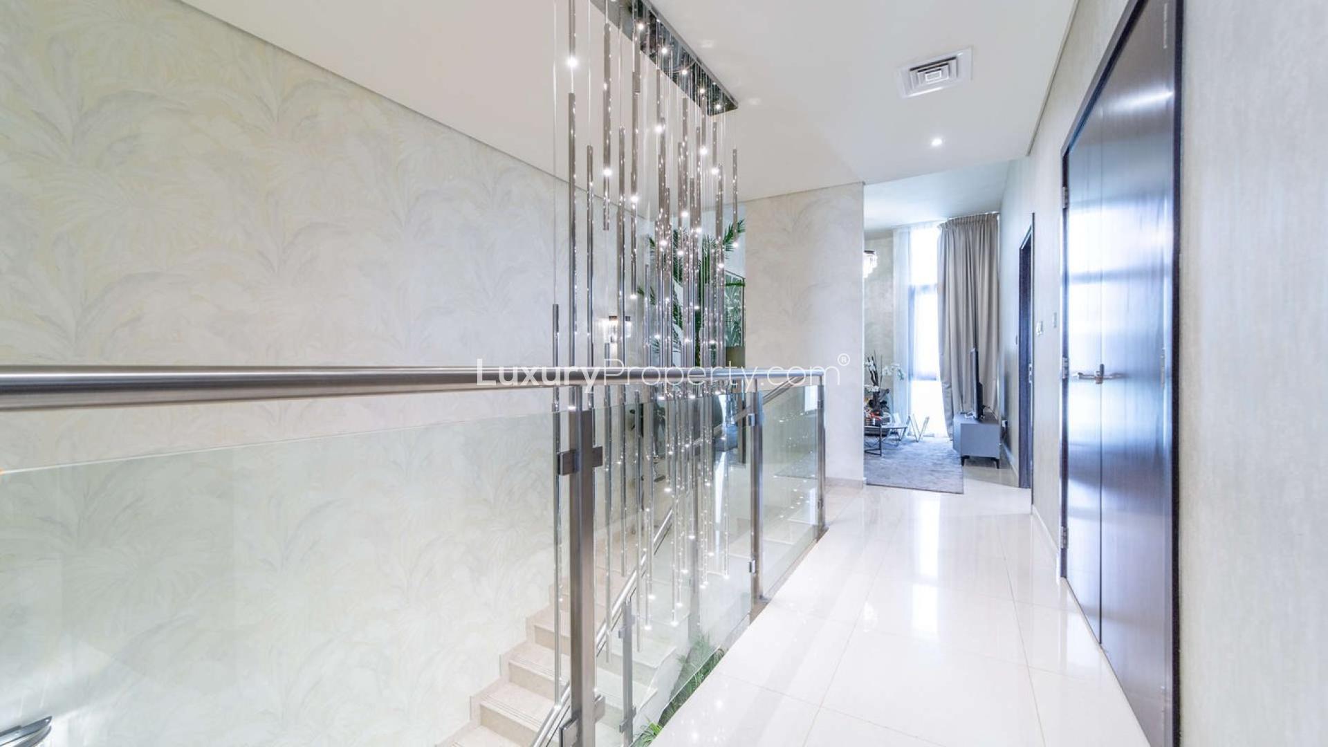 Luxurious villa exterior in Akoya Park, Damac Hills, showcasing modern design and lush landscaping