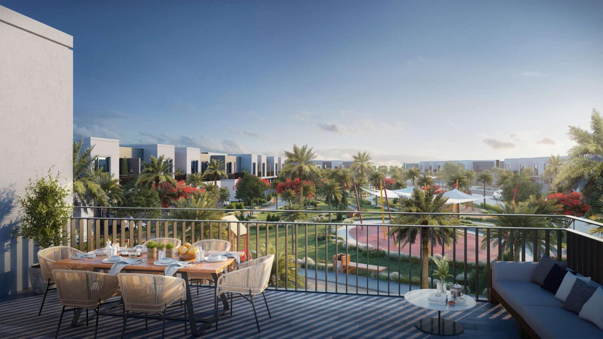 "Scenic view from balcony at Expo Golf Villas, Emaar South, Dubai South community.",Outdoor dining area with garden view at Expo Golf Villas, Emaar South, Dubai South