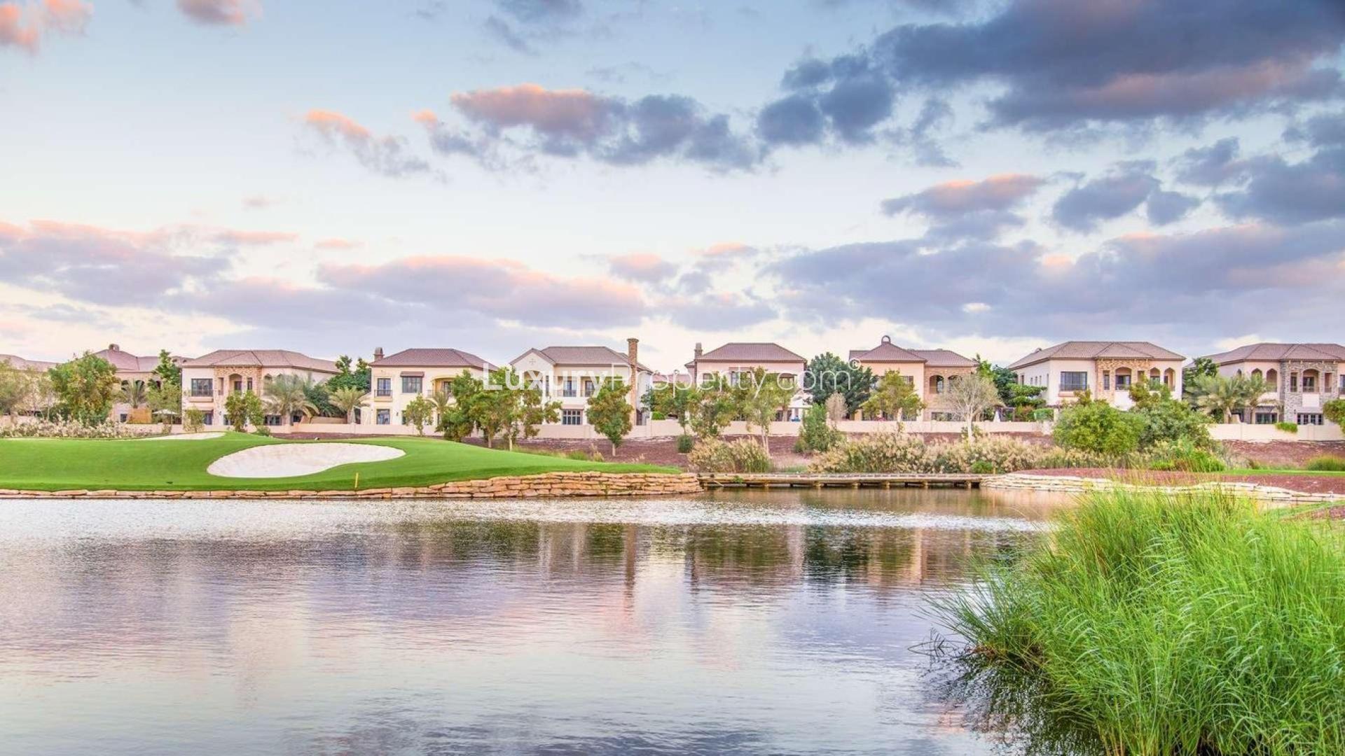 Orange Lake villa view, serene waterfront, lush greenery, Jumeirah Golf Estates, Fire community