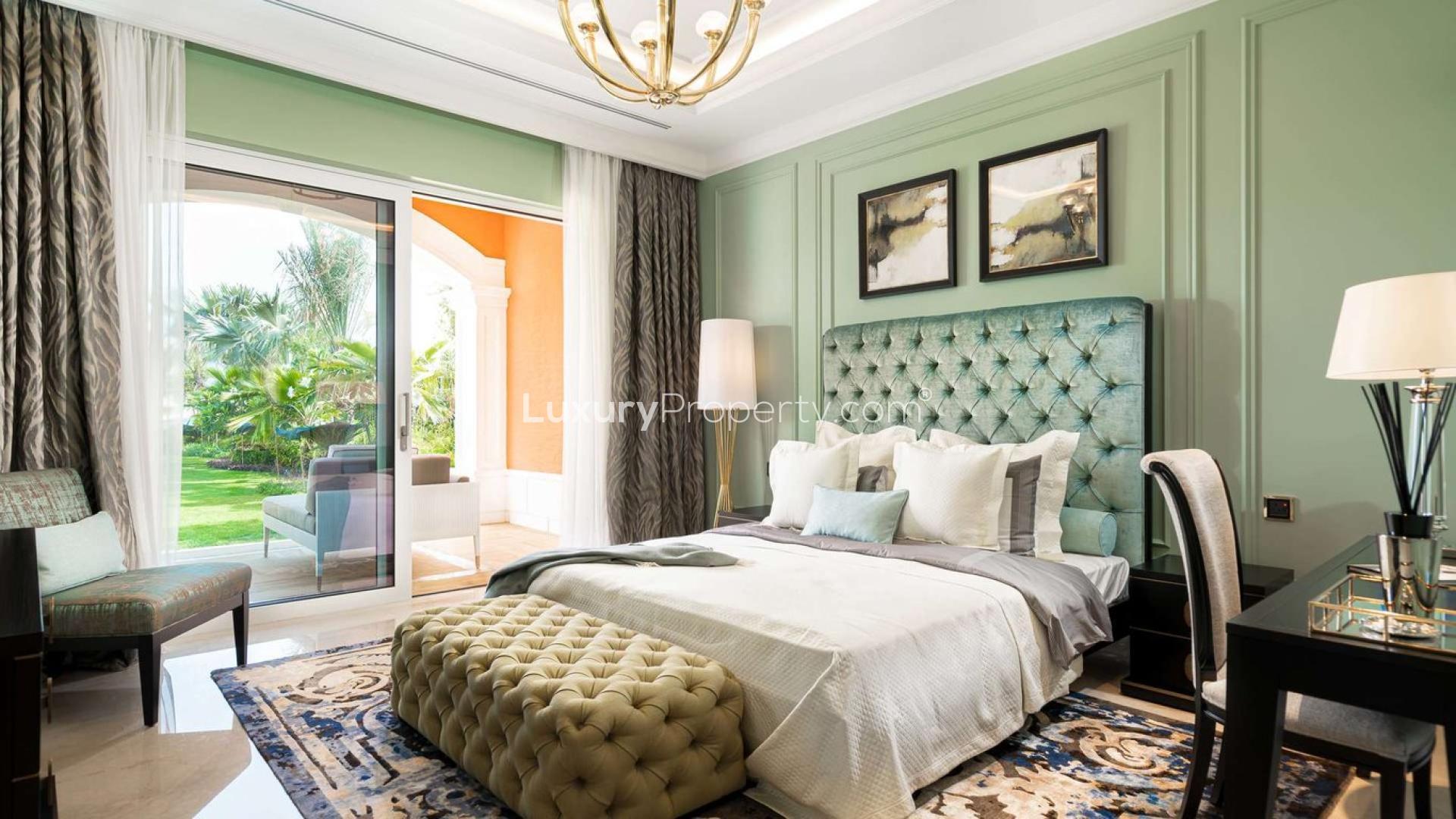 Luxurious living room in XXII Carat villa, Palm Jumeirah, featuring elegant decor and furnishings