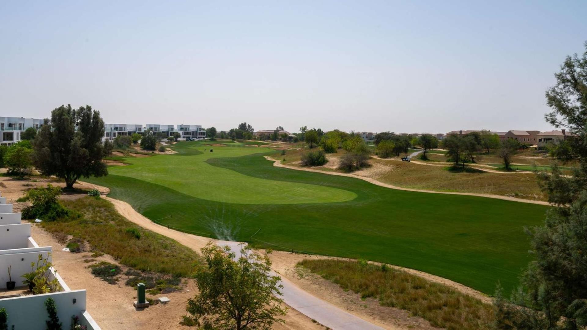 Golf course view from contemporary townhouse in Jumeirah Golf Estates, Jumeirah Luxury community